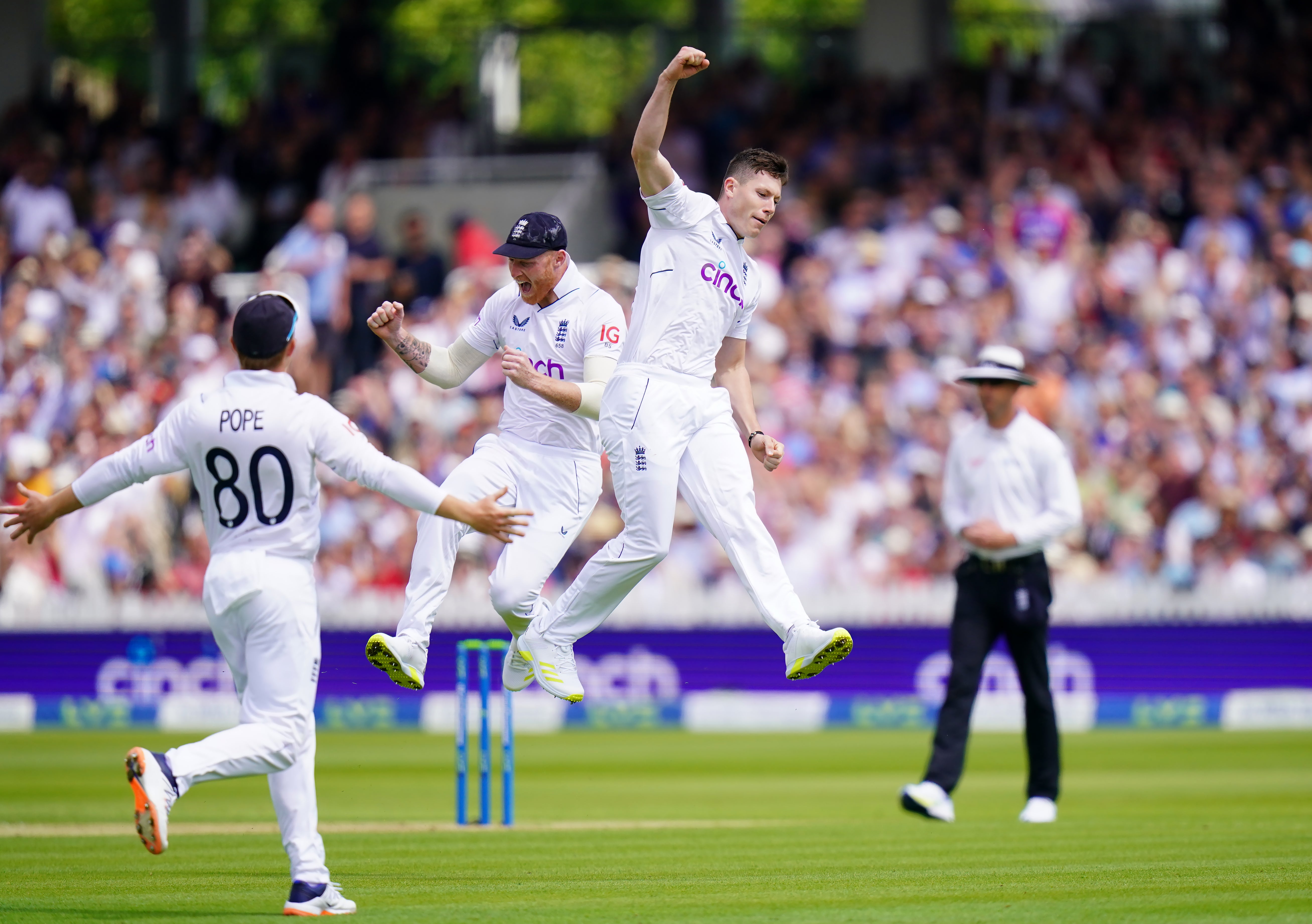 Matthew Potts, right, and Ben Stokes, centre, celebrate the wicket of New Zealand captain Kane Williamson (Adam Davy/PA)