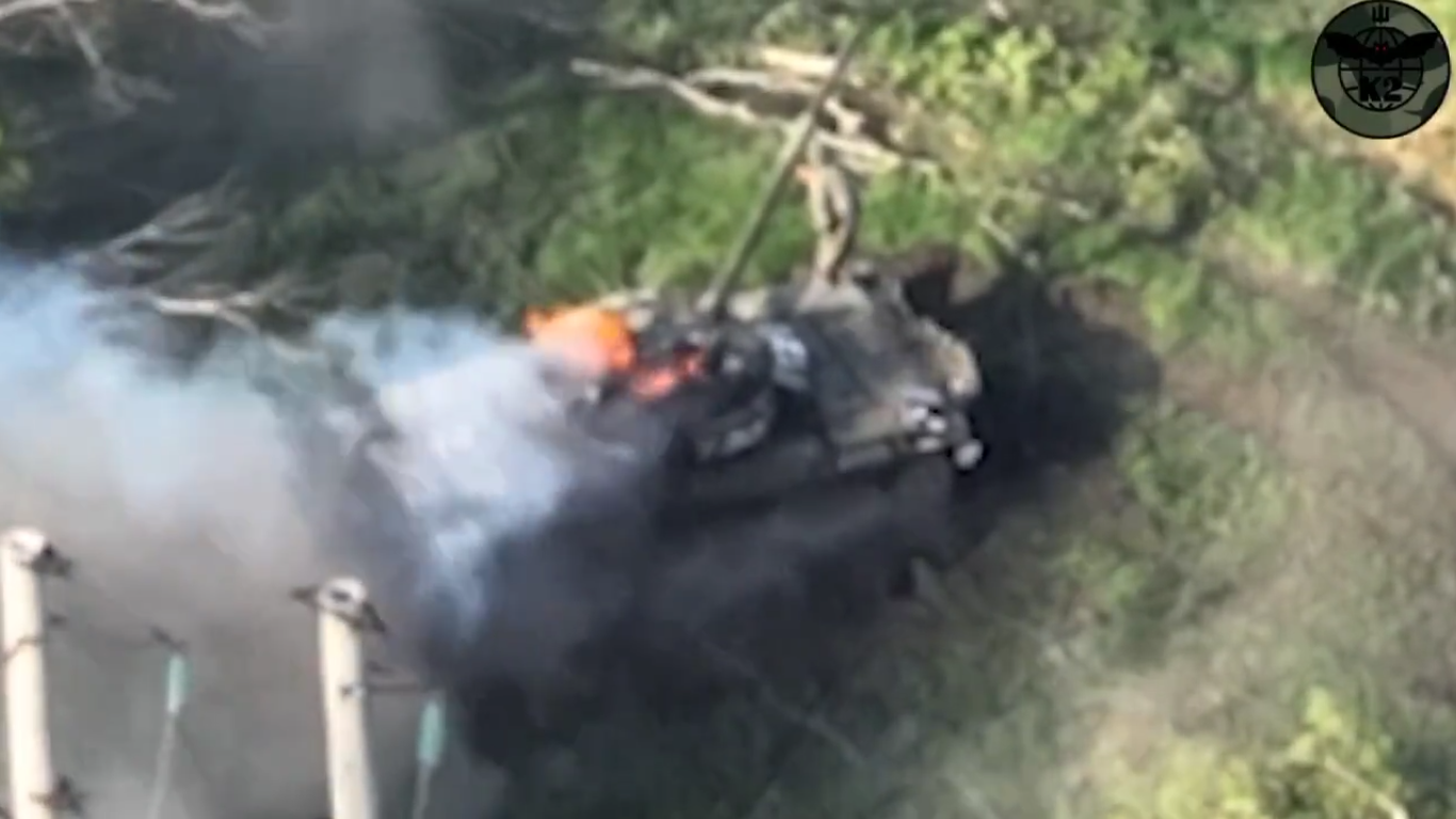 A soldier is seen atop a burning tank in the video shared by Ukraine’s 54th Mechanized Brigade