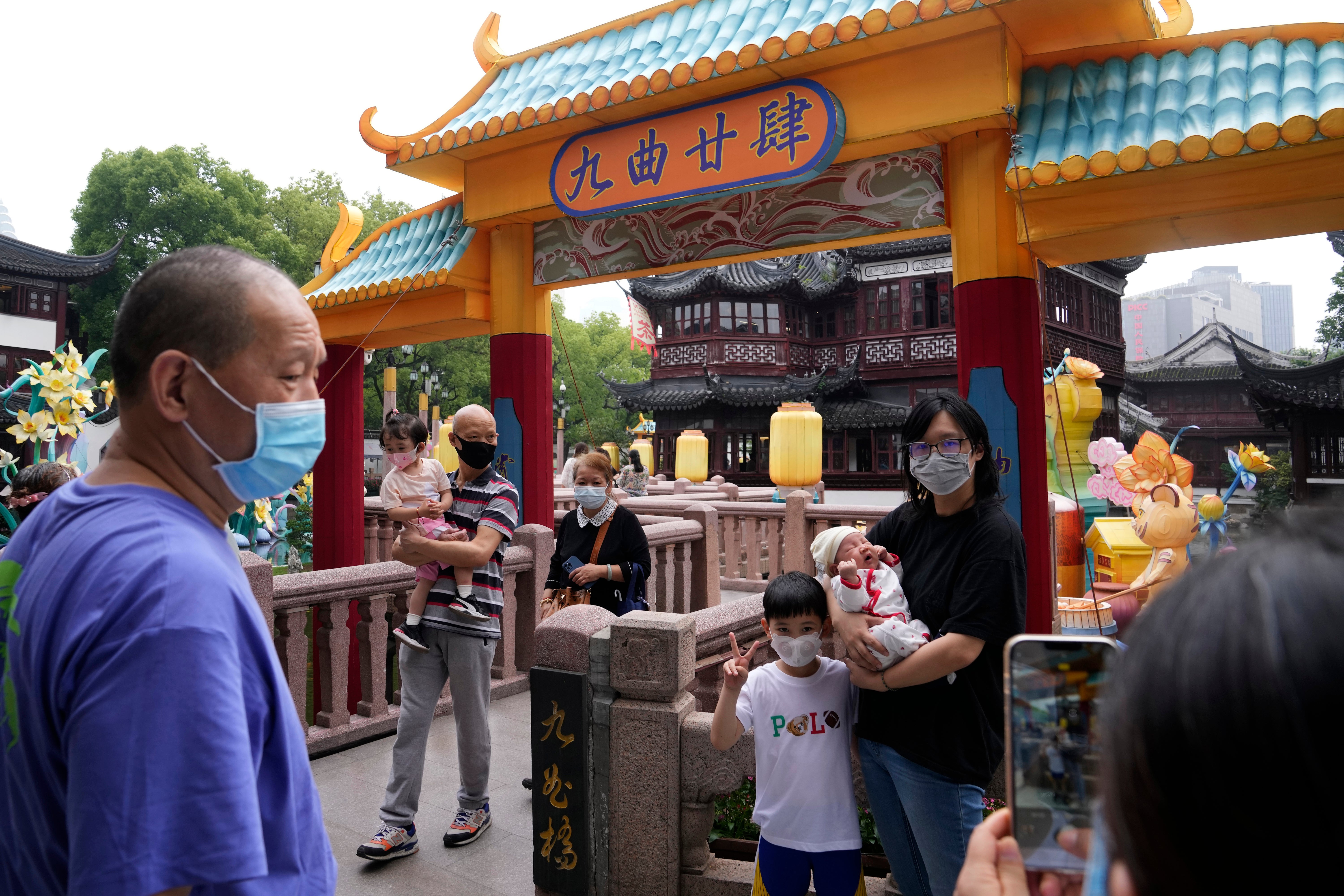 Residents wearing masks visit Yu Garden Mall on 2 June