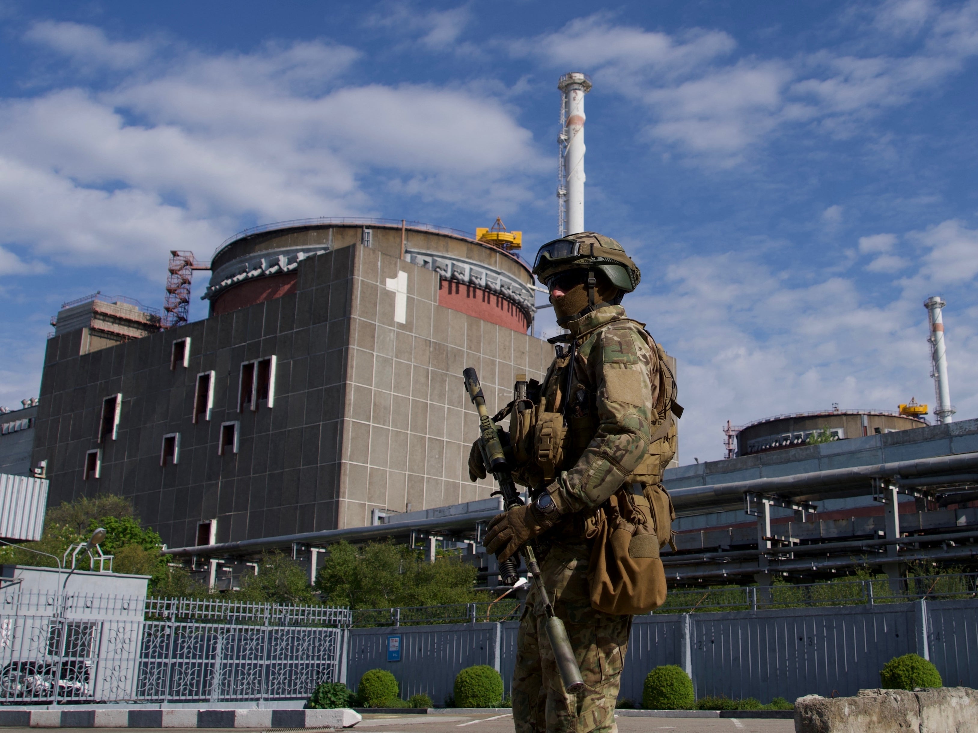 A Russian serviceman patrols the territory of the Zaporizhzhia nuclear power station