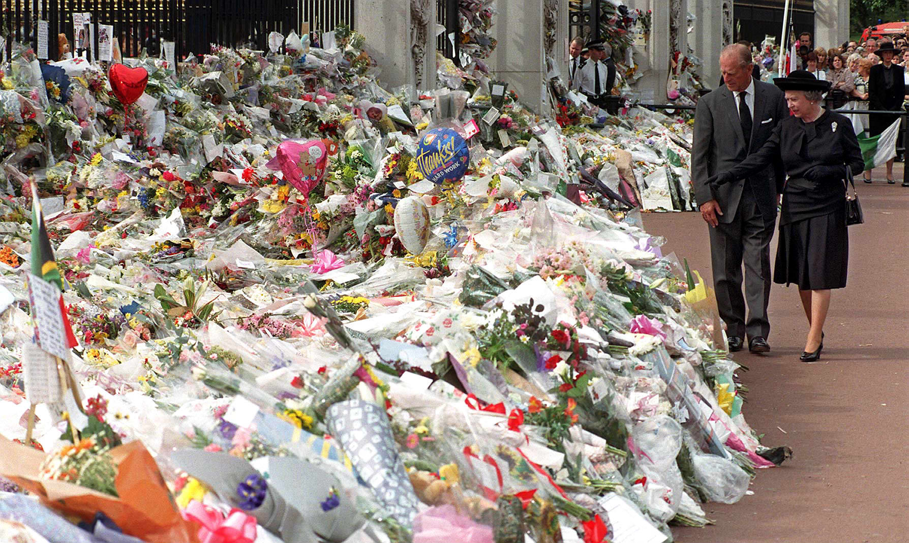 The Queen and the Duke of Edinburgh among the flowers and tributes left outside Kensington Palace following the death of Diana, Princess of Wales in 1997