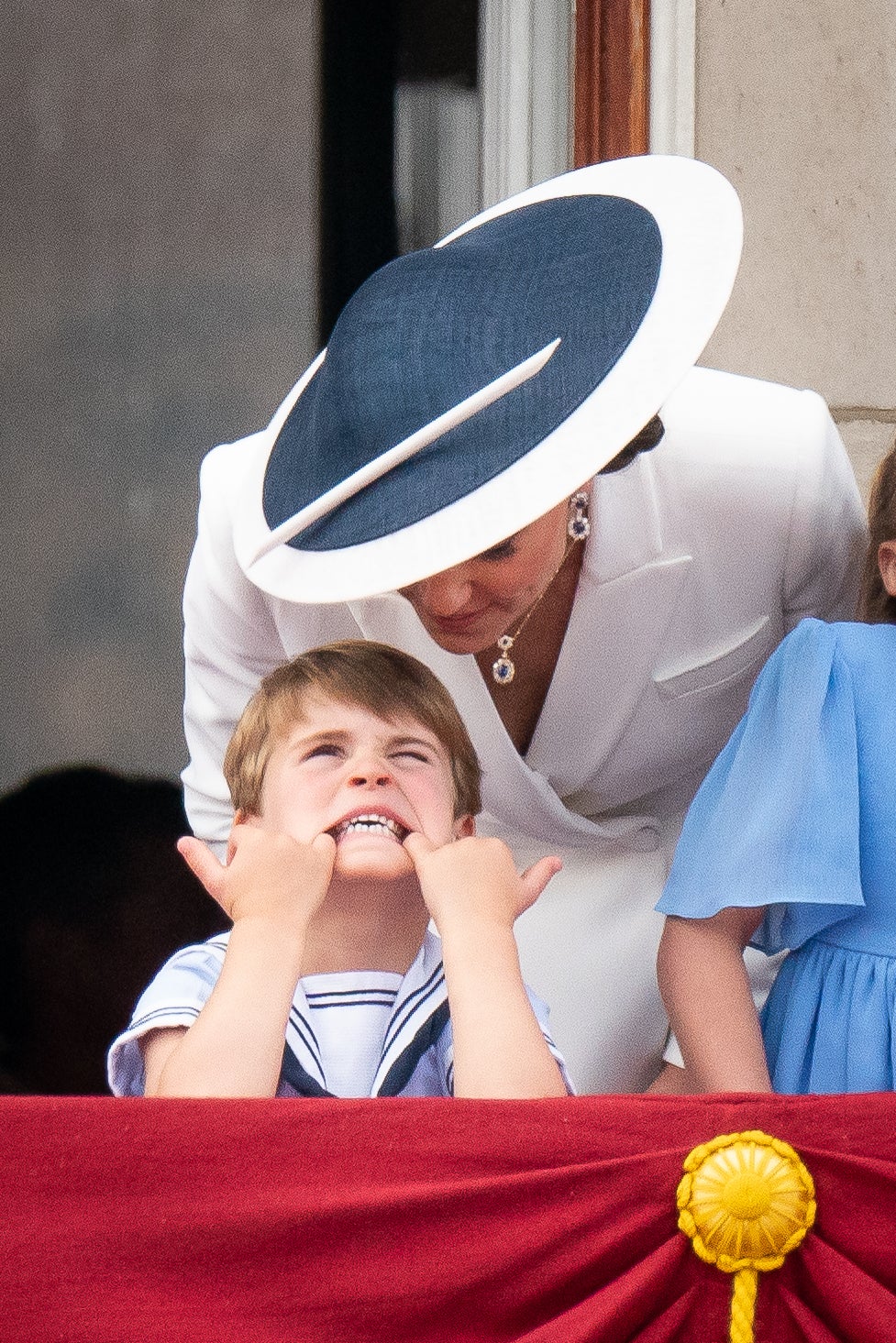 The Duchess of Cambridge speaks to prince Louis as he pulls a face (Aaron Chown/PA)