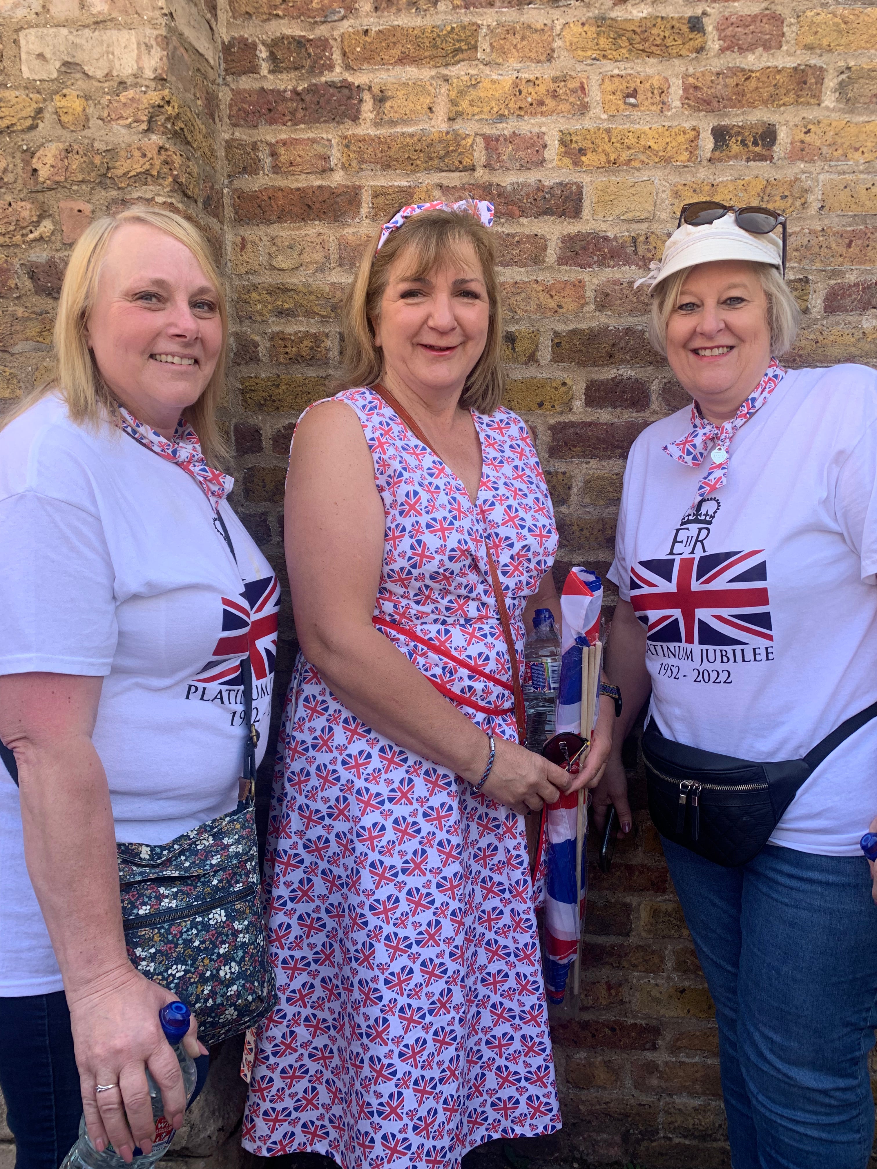 Yvonne (L), Rita (centre) and Allison (R) travelled down from the West Midlands last night before waking up at the crack of dawn to bag their spot on the Mall