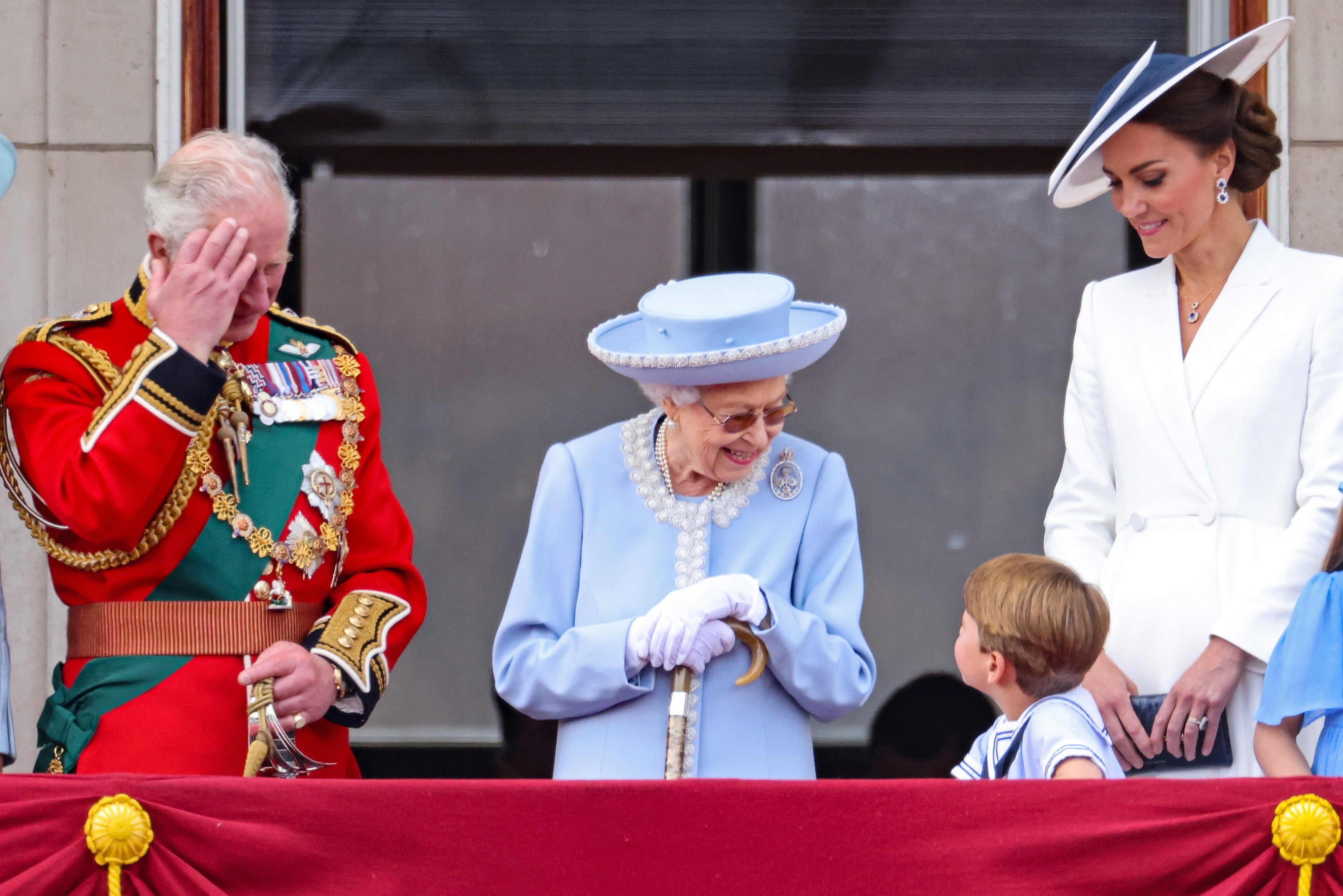 Prince Charles, Prince of Wales, Queen Elizabeth II, Prince Louis of Cambridge and Catherine, Duchess of Cambridge on the balcony of Buckingham Palace