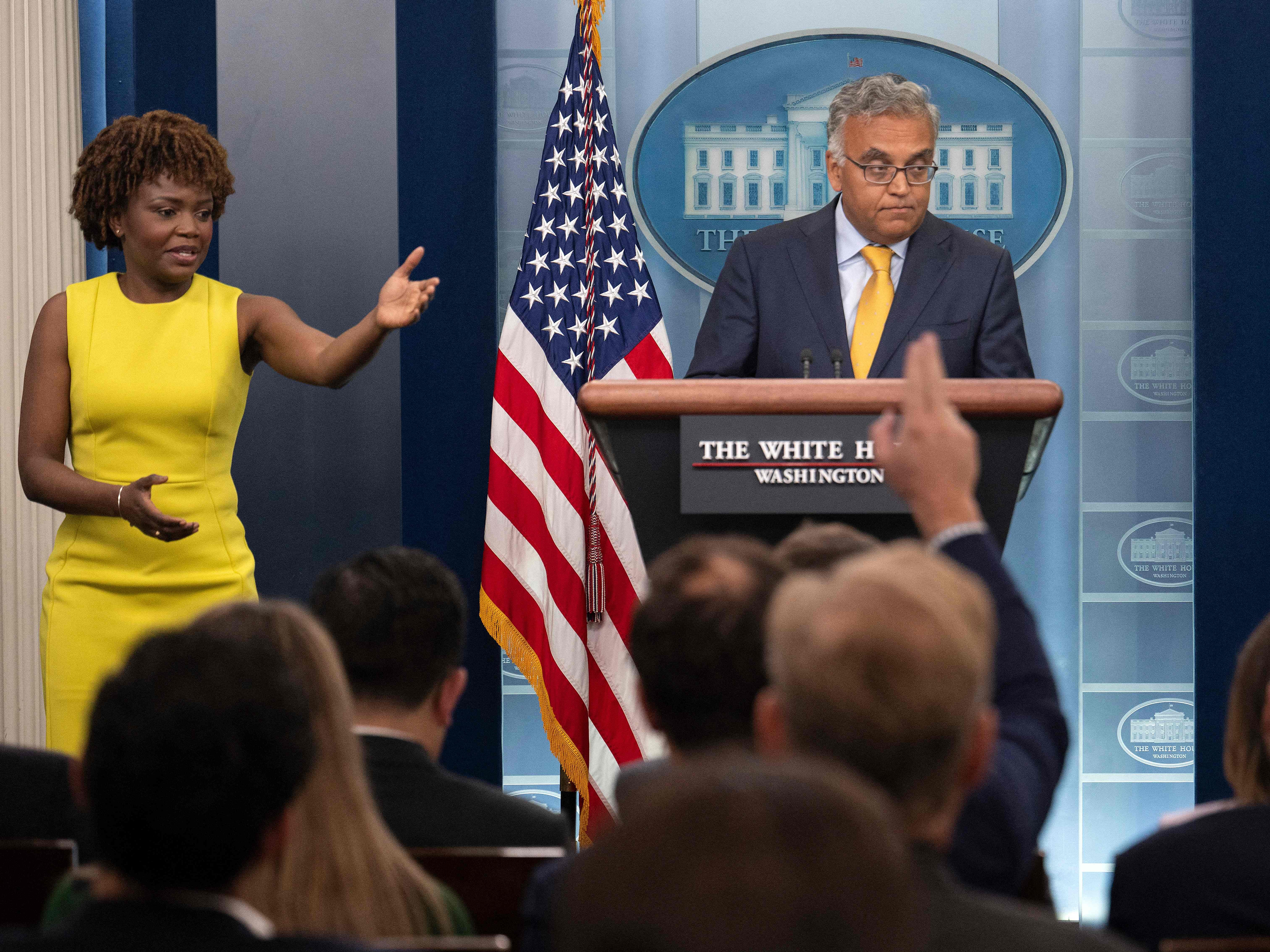 White House Covid-19 Response Coordinator Dr. Ashish Jha speaks flanked by White House Press Secretary Karine Jean-Pierre (L) during the Daily Press Briefing at the White House in Washington, DC, on June 2, 2022