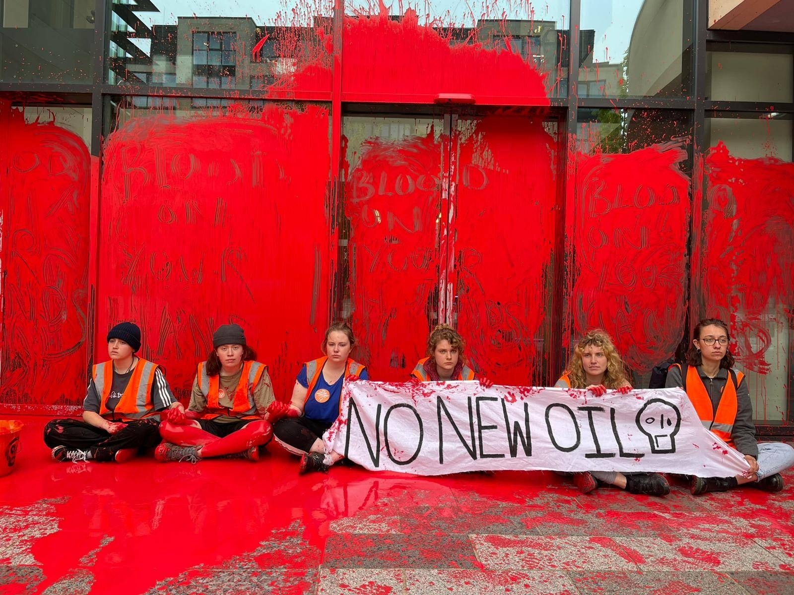 The protesters, who are calling on the government to halt all new oil and gas licences, scrawled ‘blood on your hands’ in red paint