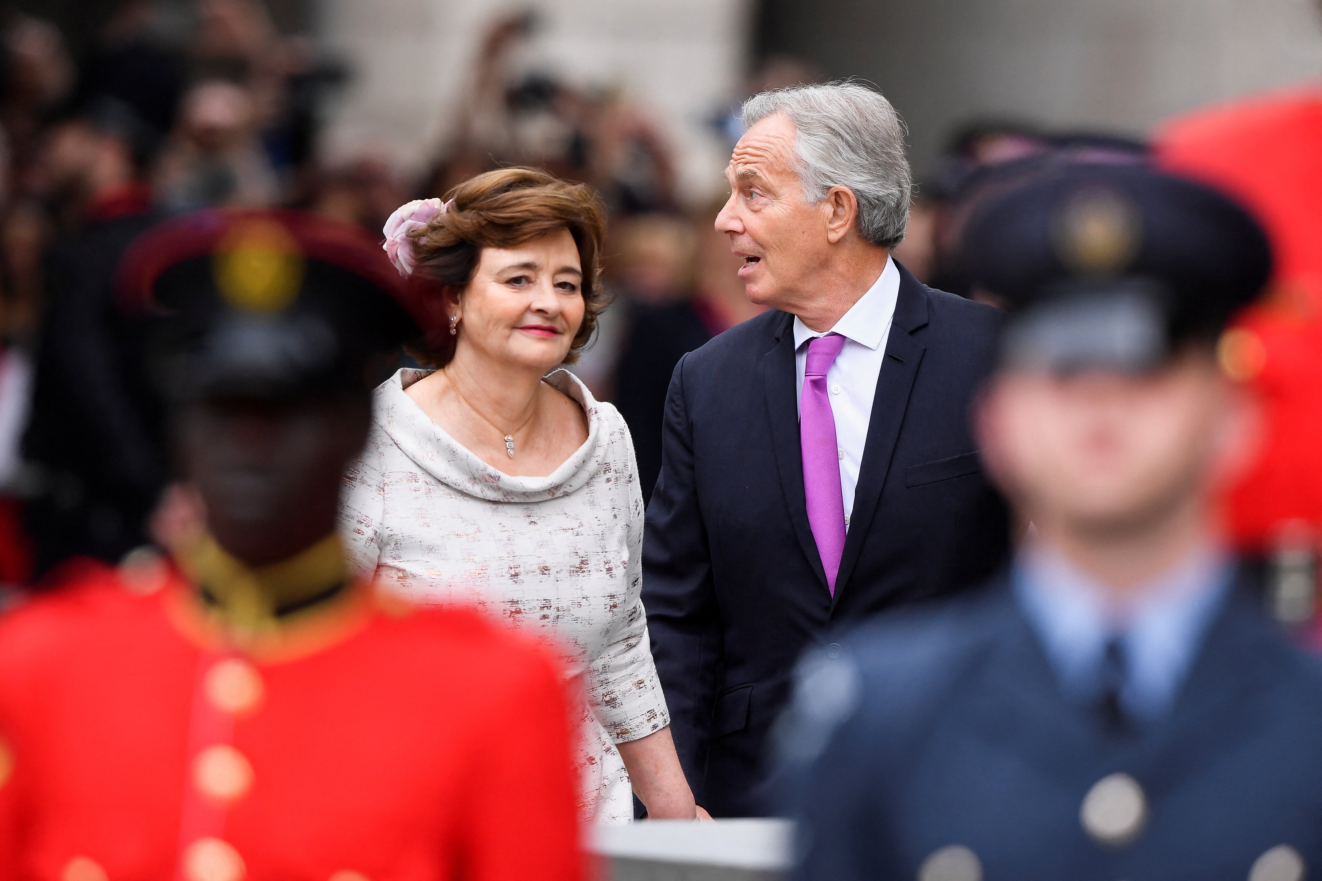 Mr Blair and his wife arriving on Friday