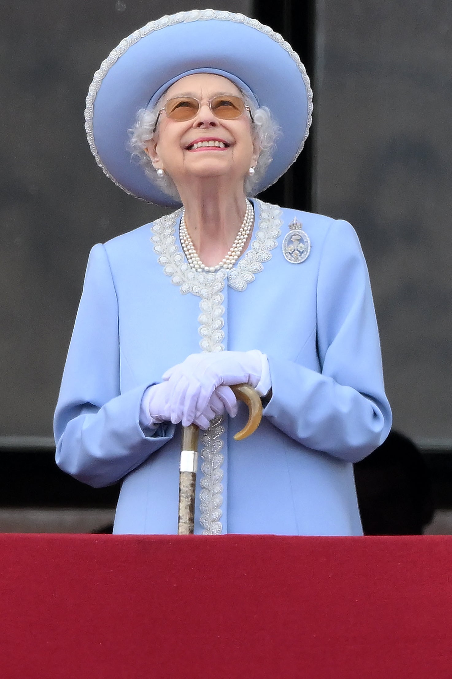 The Queen carries the walking stick