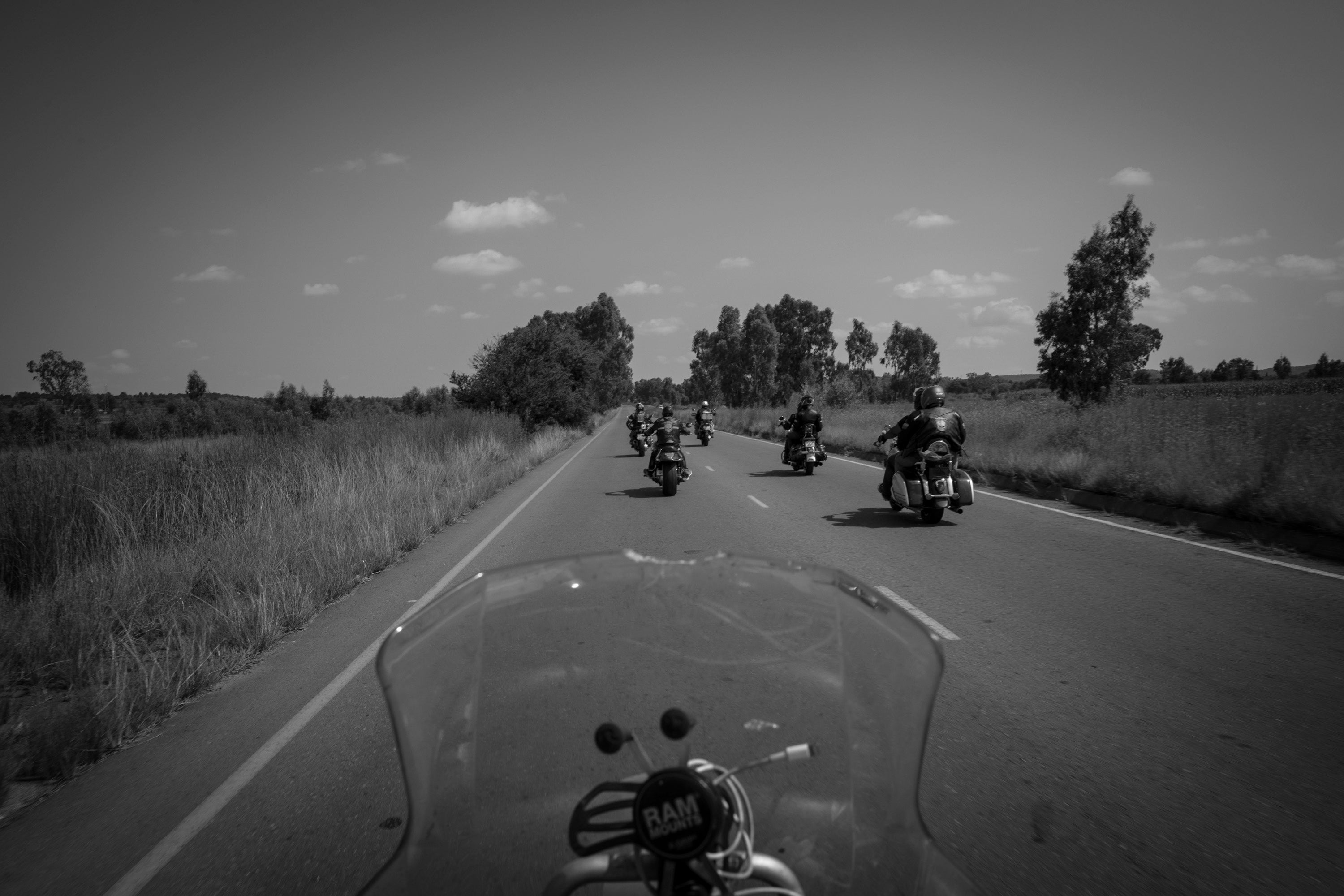 Members of the Midvaal chapter of the CMA ride with other club bikers from their church in Vereeniging to a township church in nearby Sebokeng, Johannesburg