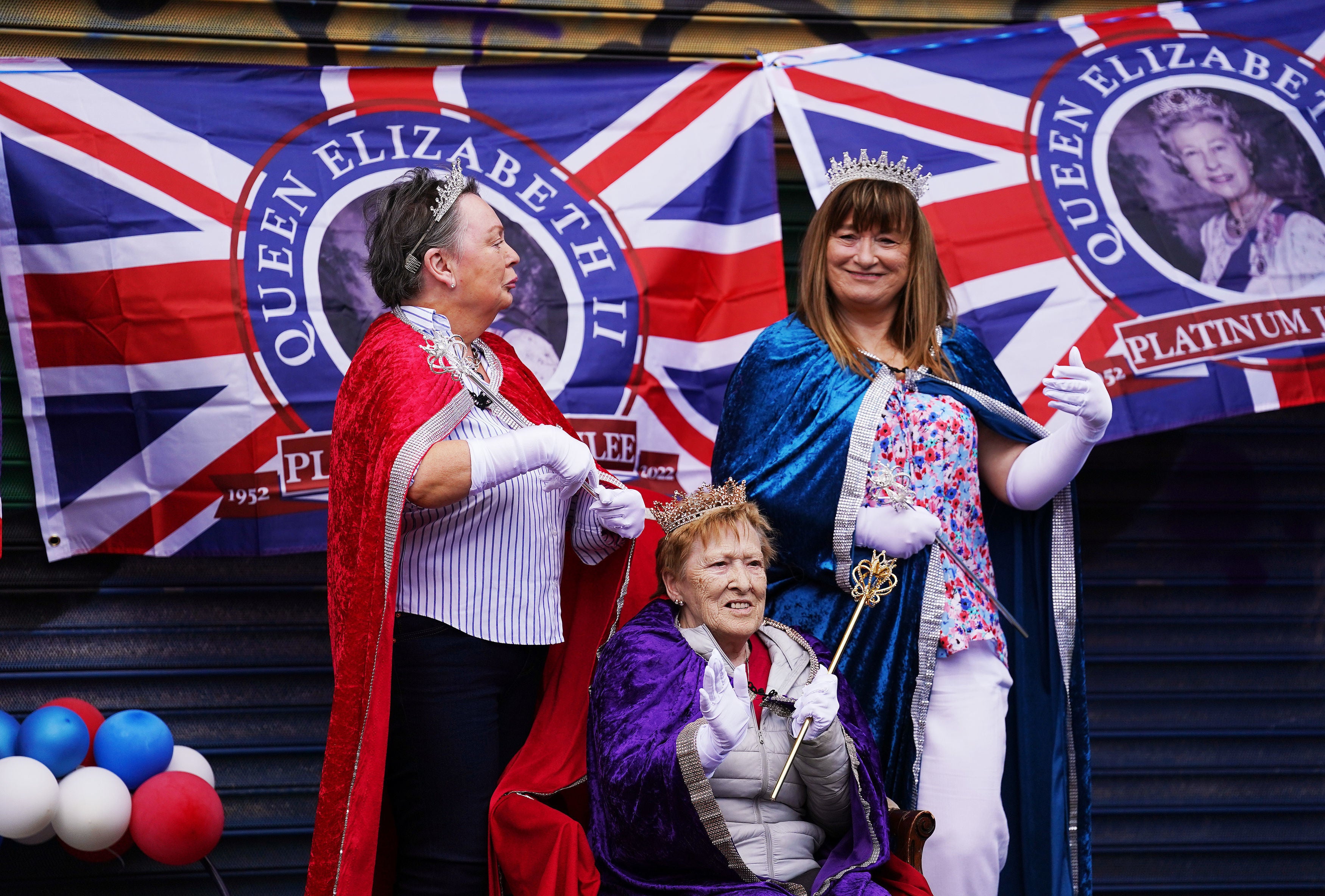 People attend a street party on Donegal Pass in Belfast city centre