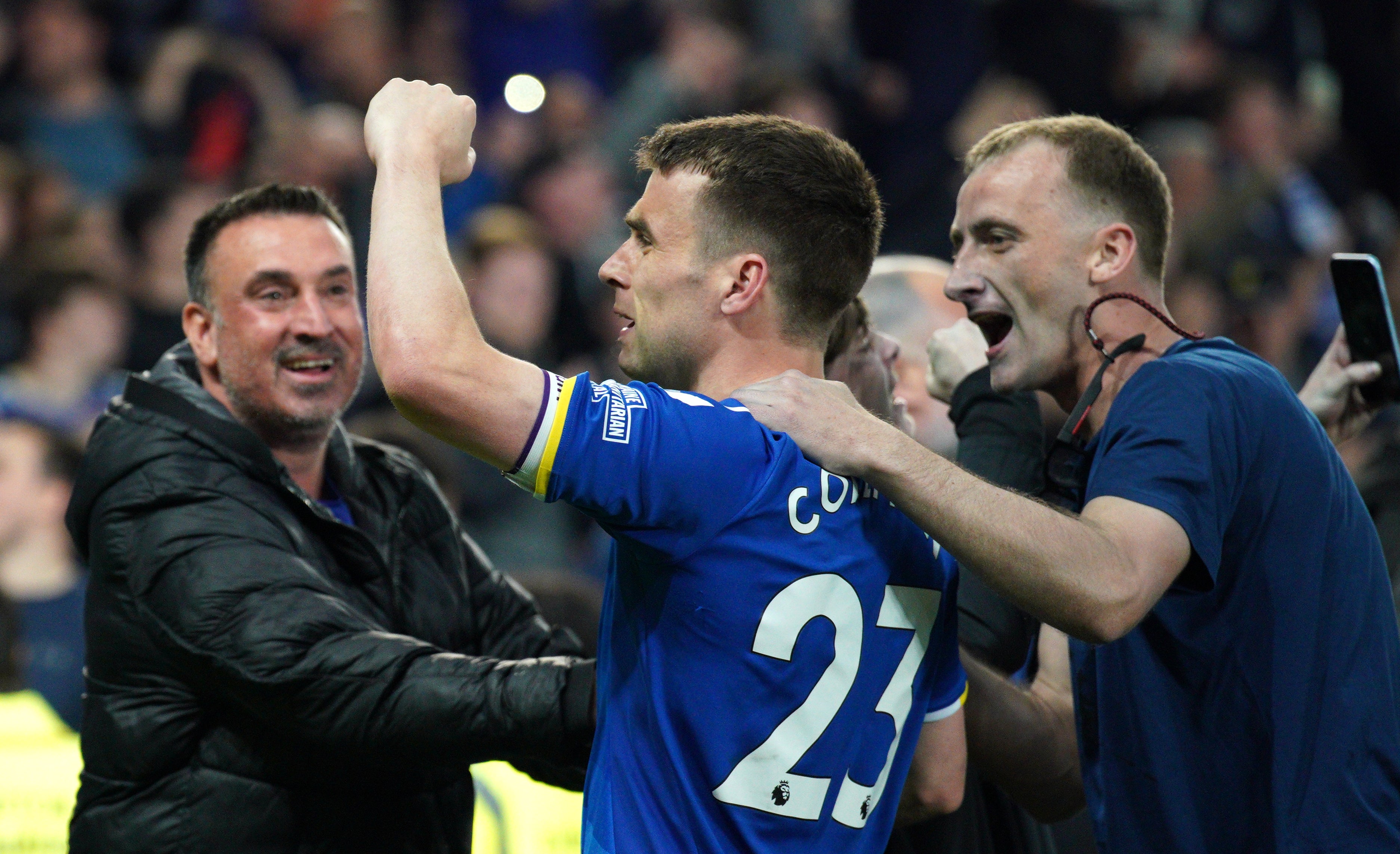 Fans mob Everton’s Seamus Coleman after the club secured their Premier League status (Peter Byrne/PA)