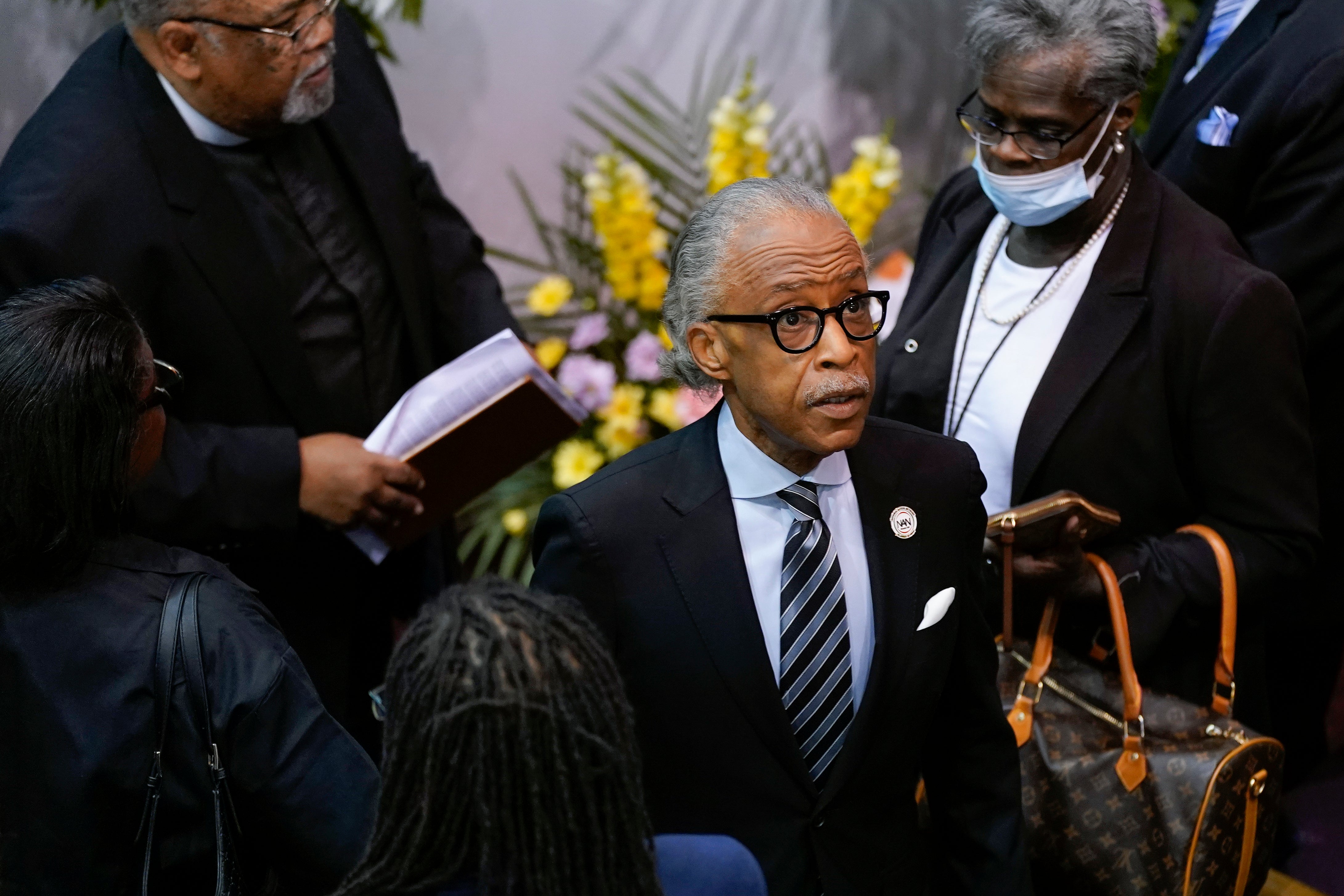 Rev. Al Sharpton at a service for the victims of the shooting