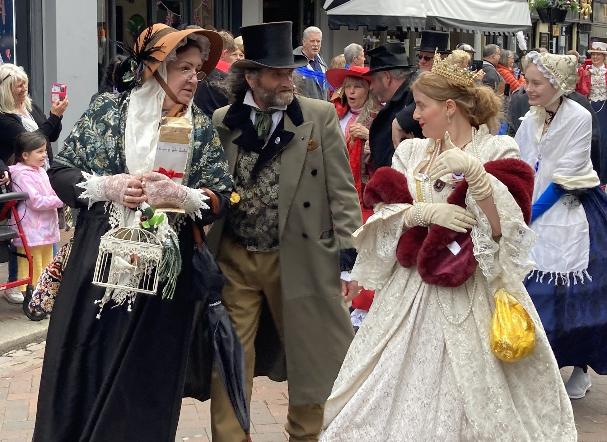 People dressed as Dickensian literary characters take part in parade at the Platinum Jubilee Dickens Festival in Rochester (Katie Boyden/PA)