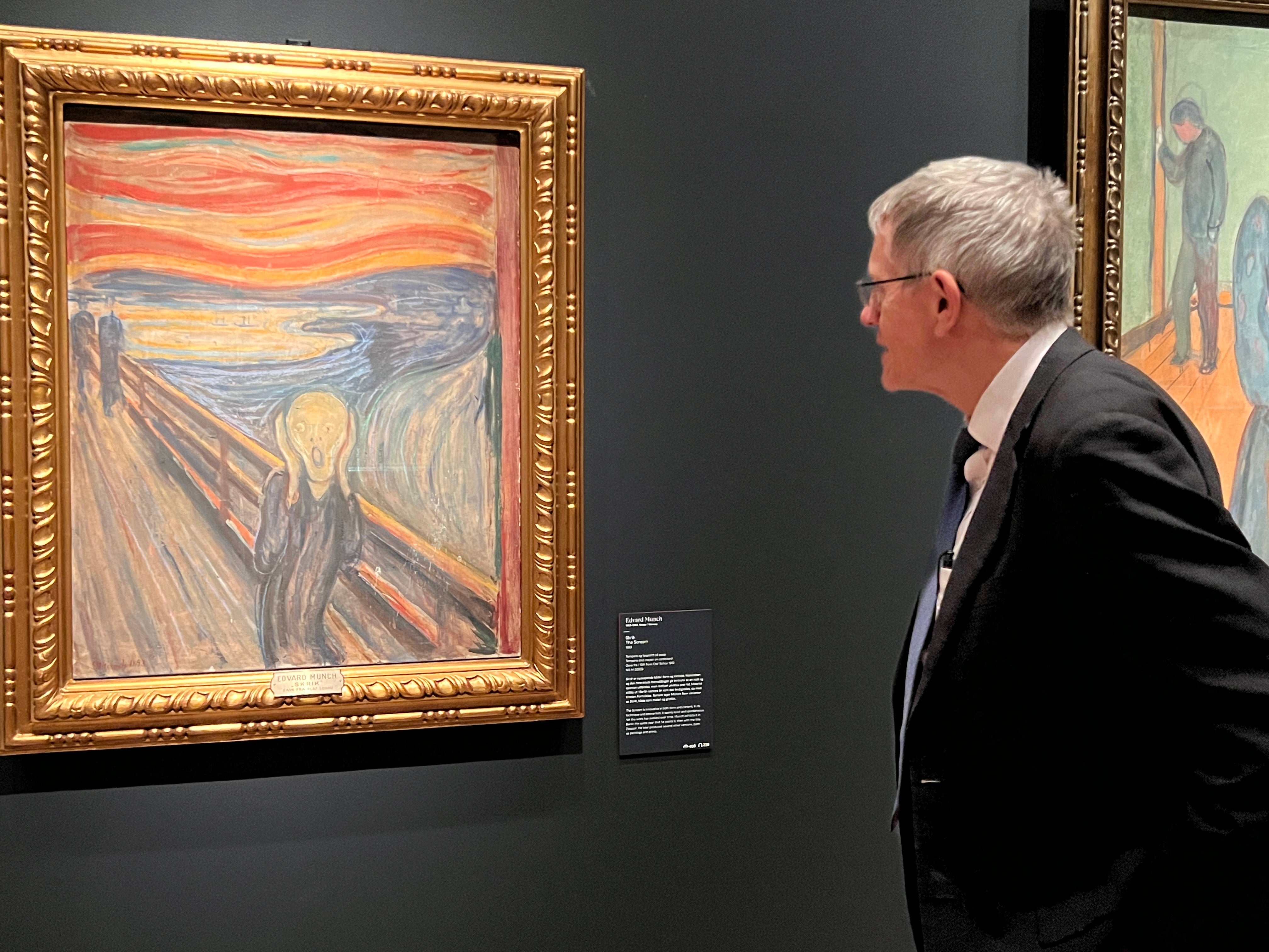 Old misery: Simon Calder (right) with the original version of Edward Munch’s The Scream