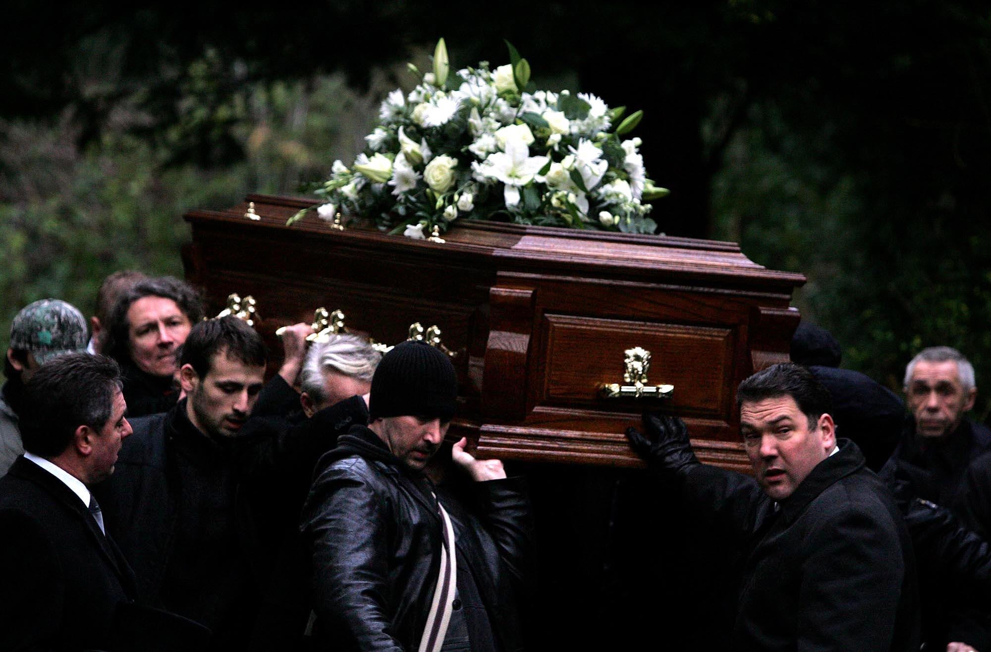 The coffin of former Russian spy Alexander Litvinenko is carried during his funeral at Highgate Cemetery in north London (Pool/PA)