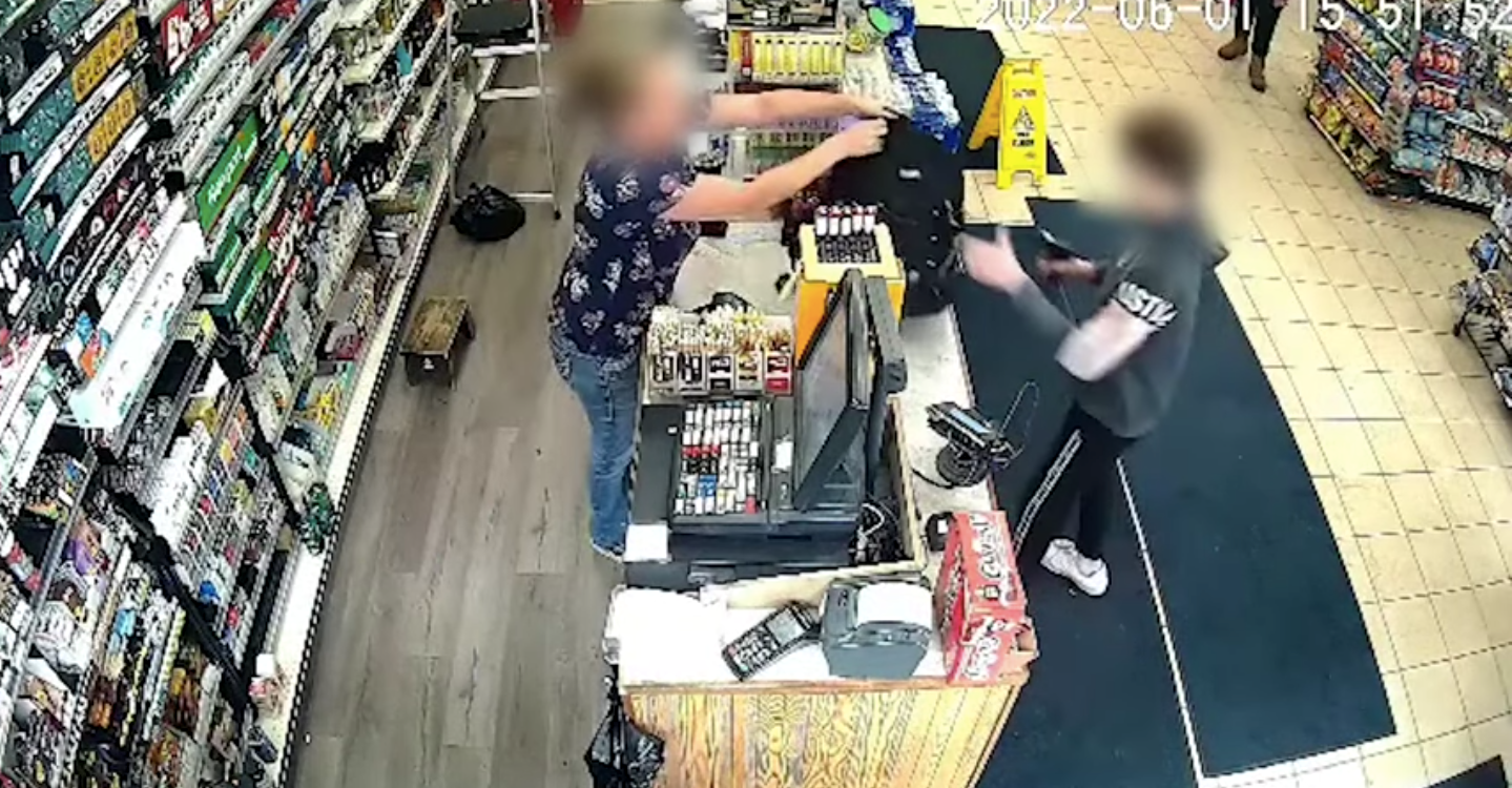 After the clerk filled the armed 12-year-old boy’s backpack with money from the till, she can be heard telling him to ‘get out!’