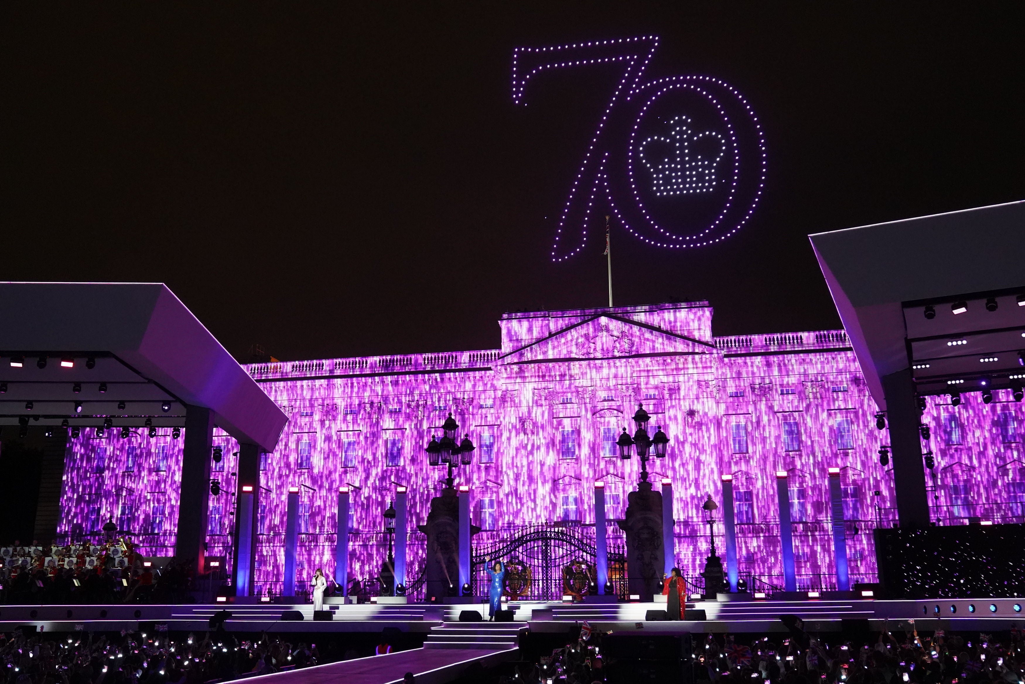 The number 70 lit up over the palace