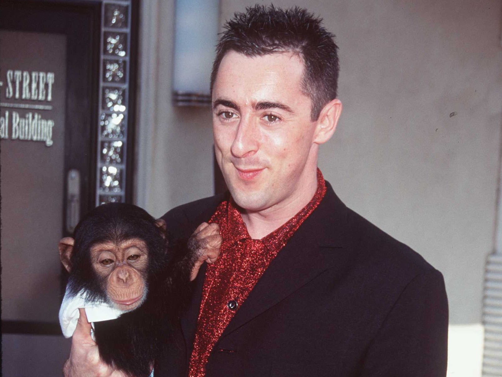 Alan Cumming and Tonka at the 1997 premiere of ‘Buddy'