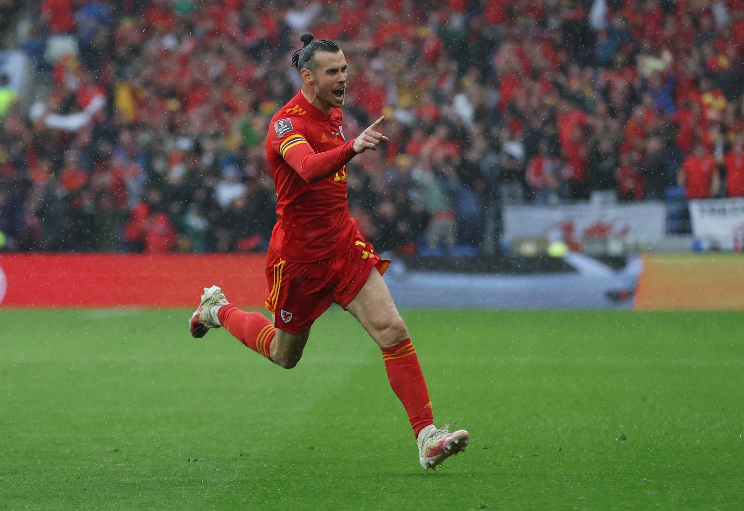 ...Gareth Bale celebrates putting Wales in front