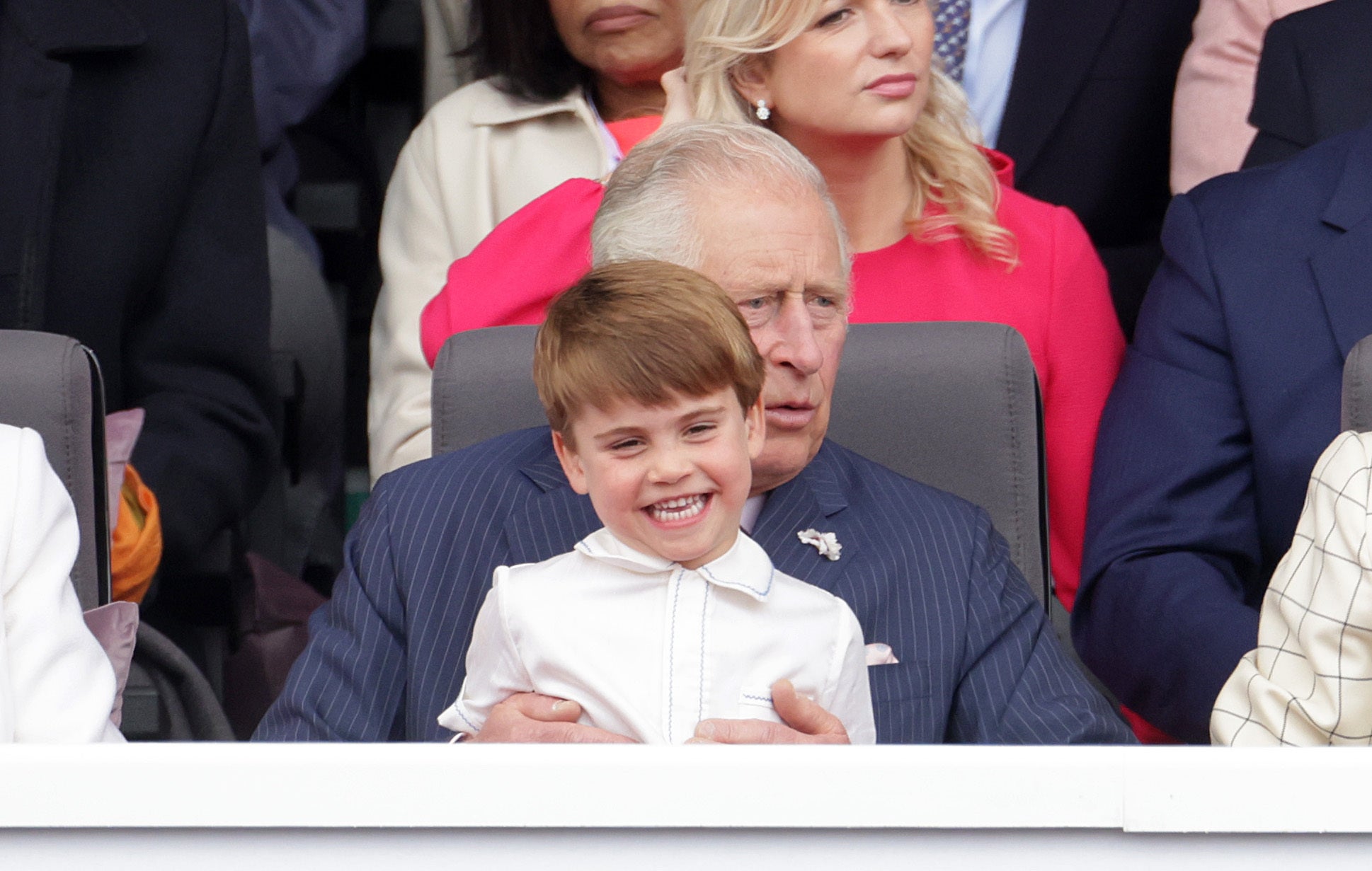 Prince Louis sits on his the Prince of Wales’ lap (Chris Jackson/PA)