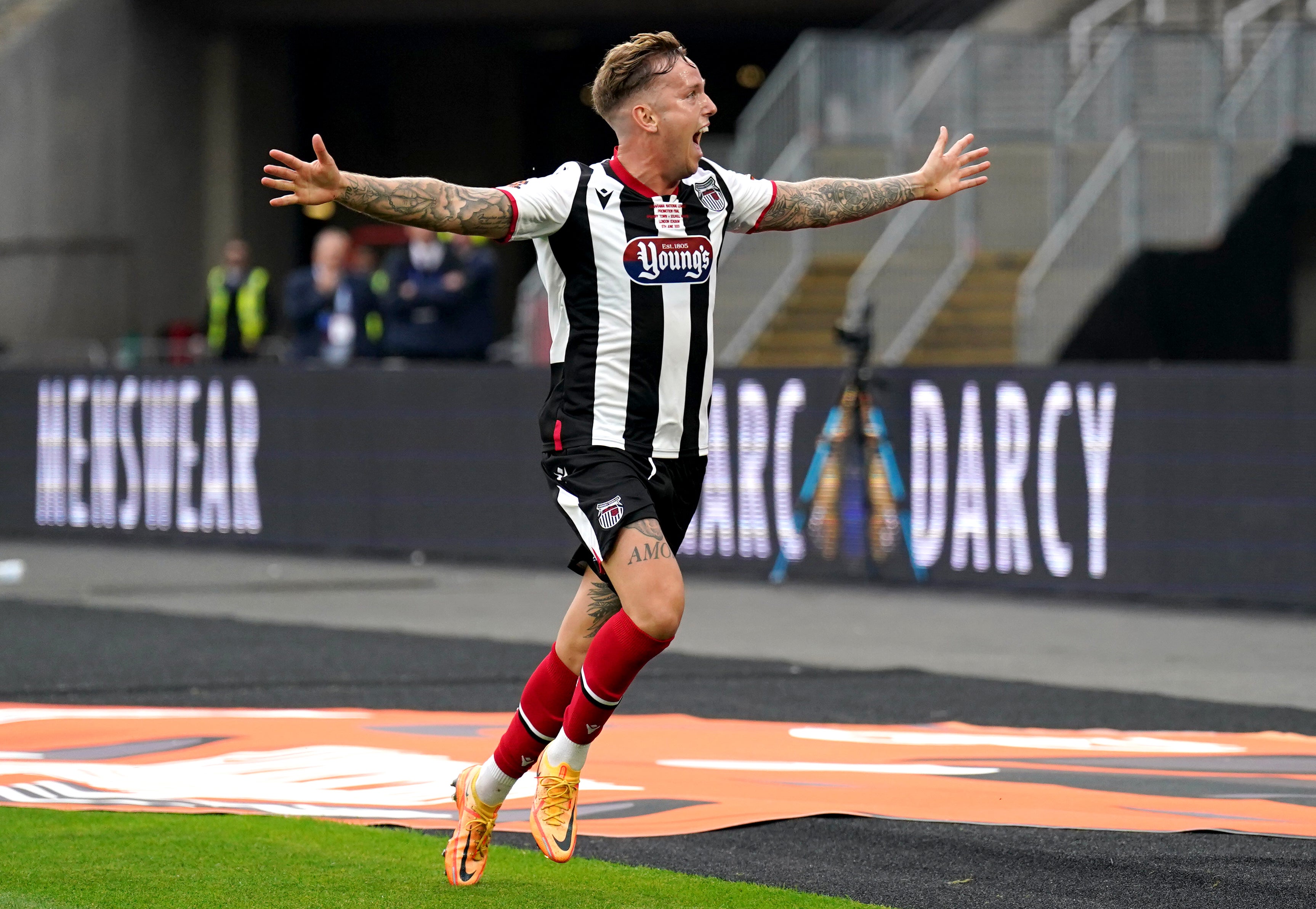 Jordan Maguire-Drew celebrates scoring Grimsby’s winner (Tim Goode/PA)