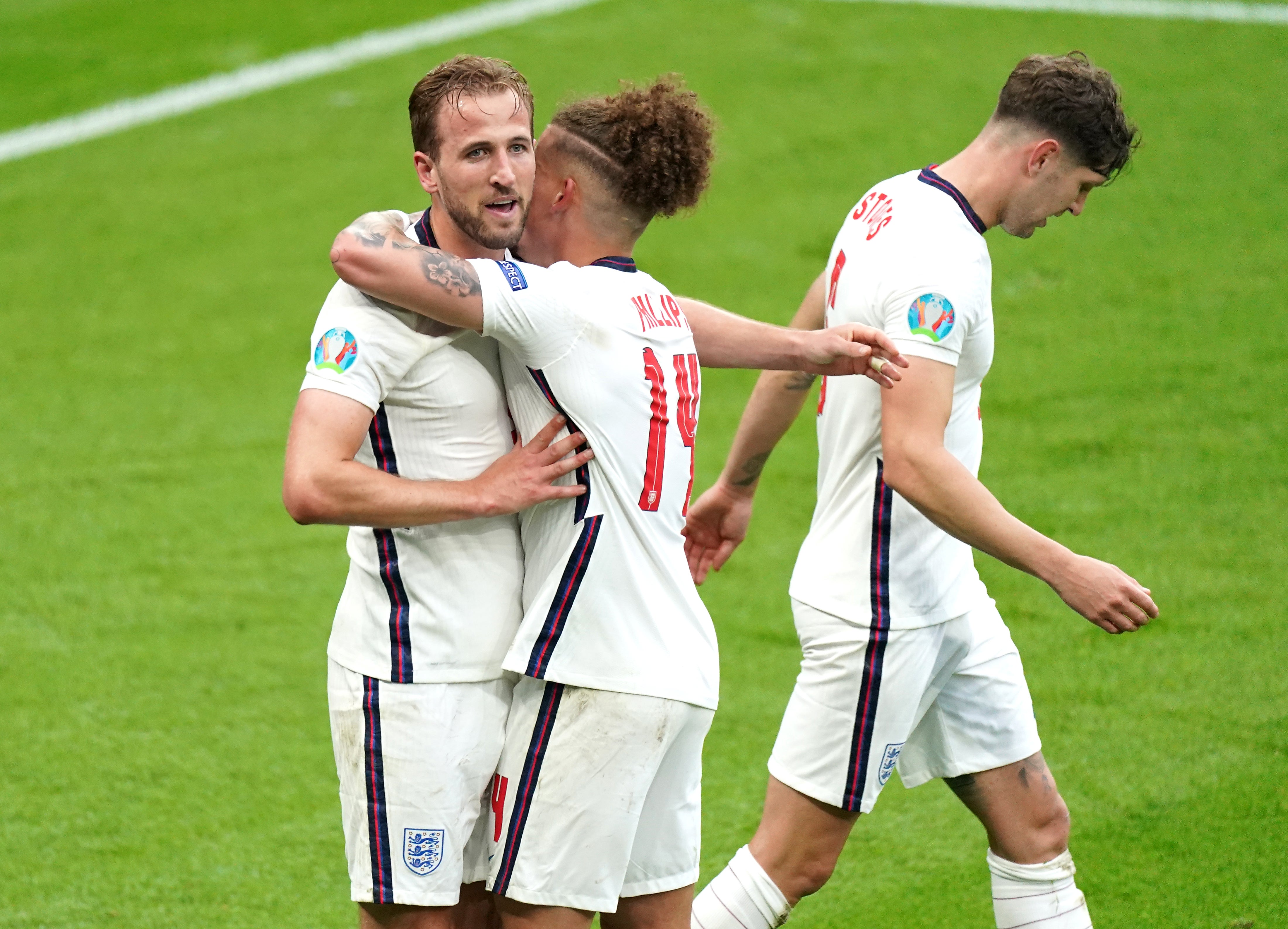 Phillips (centre, hugging captain Harry Kane) starred as England beat Germany at Euro 2020 last summer (Mike Egerton/PA)