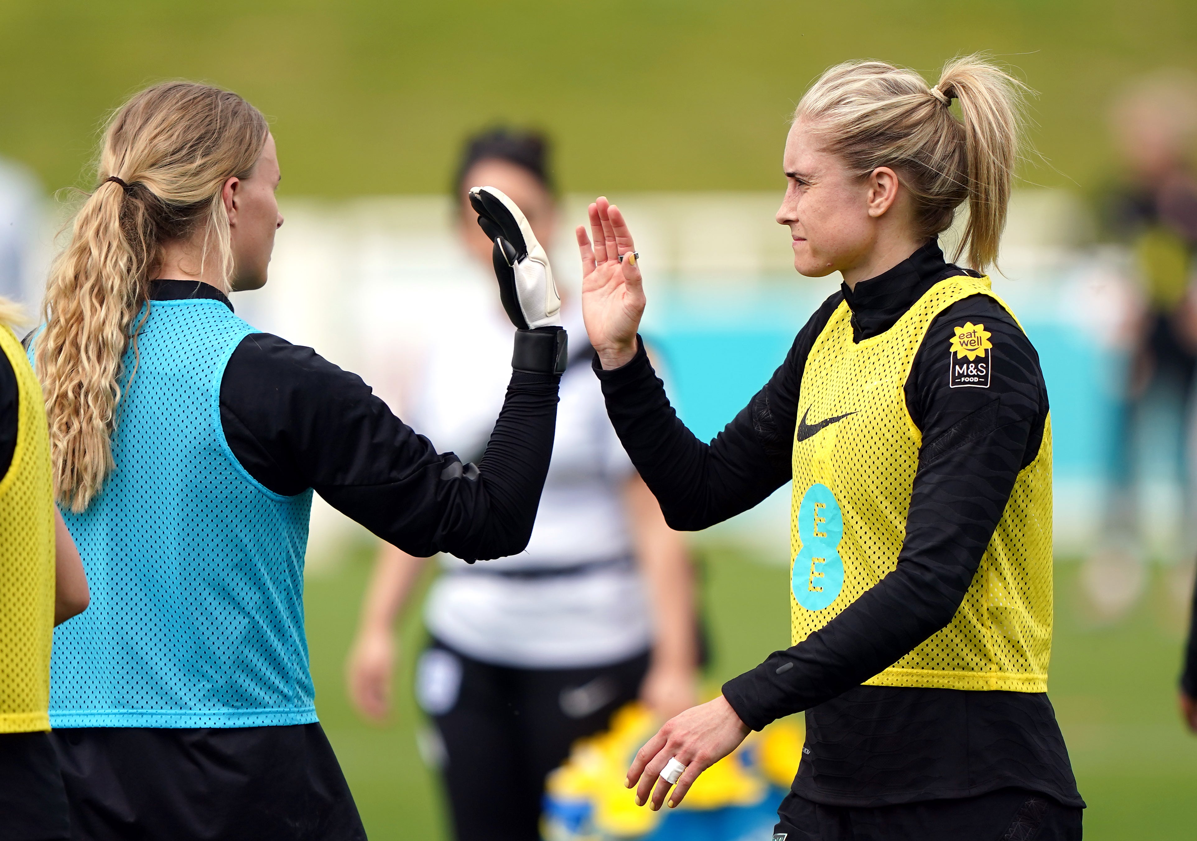 Steph Houghton, right, is stepping up her training with England Women at St George’s Park (Joe Giddens/PA)