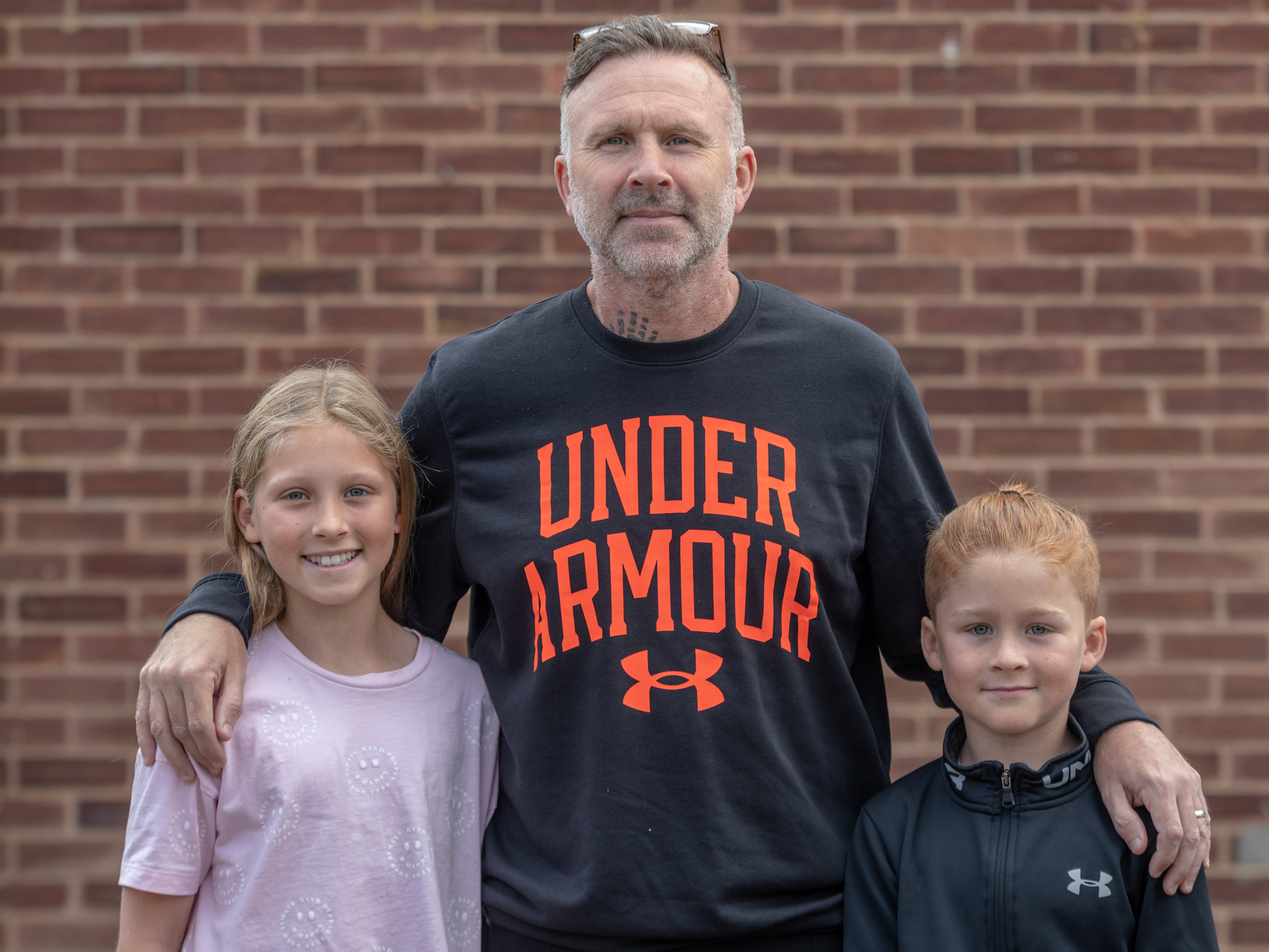 Stewart Waters with his children Sadie and Jude, who saved his life when he went into cardiac arrest