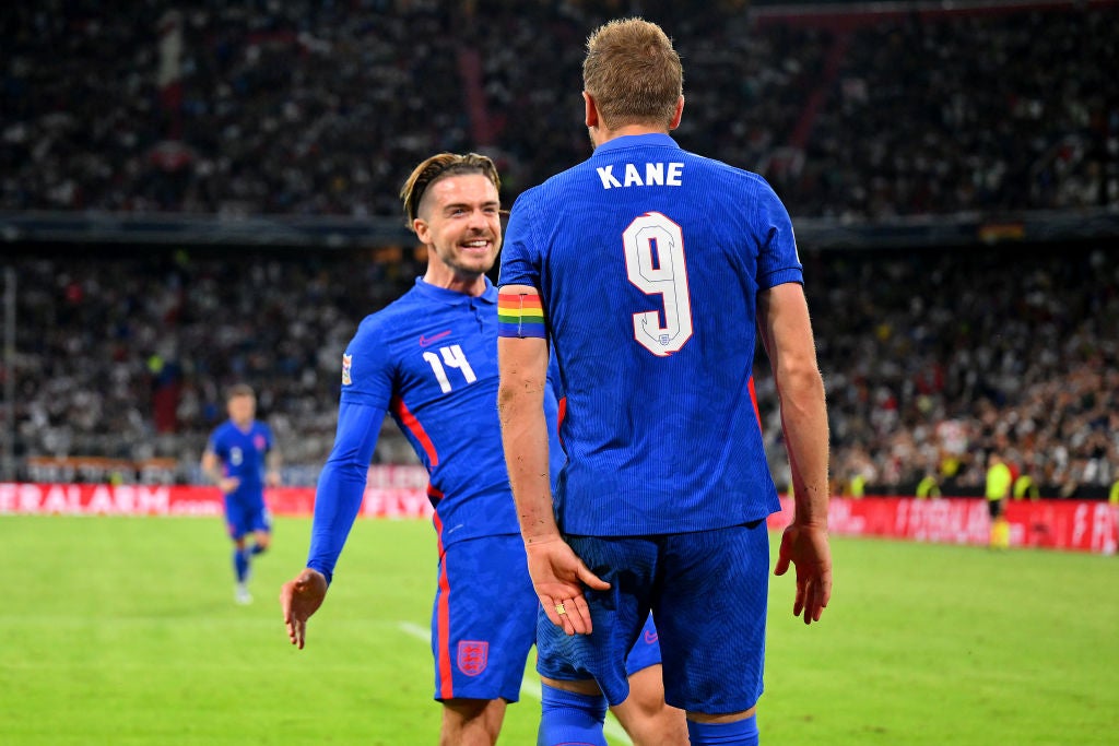 Captain Harry Kane and Jack Grealish celebrate