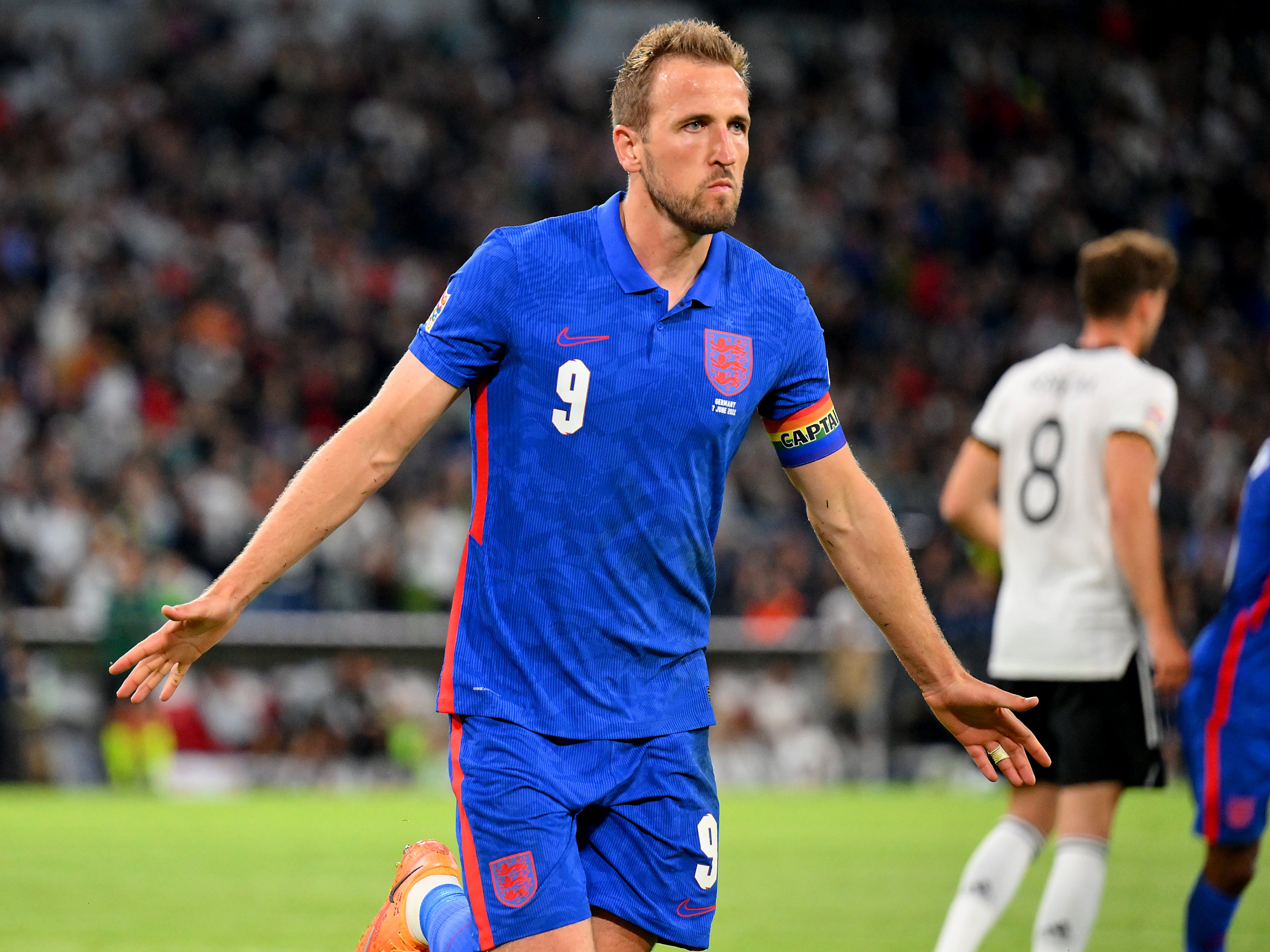 England captain Harry Kane celebrates equalising against Germany from the penalty spot