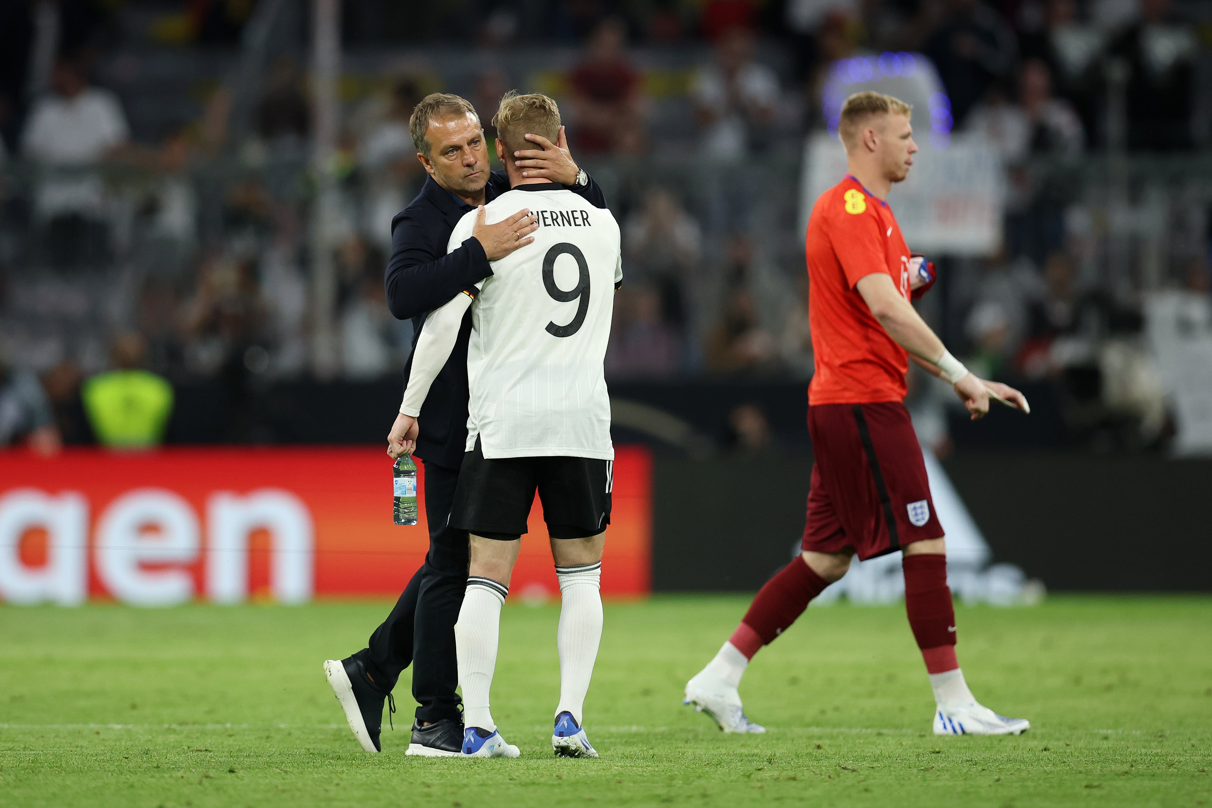 Flick embraces Timo Werner after the match