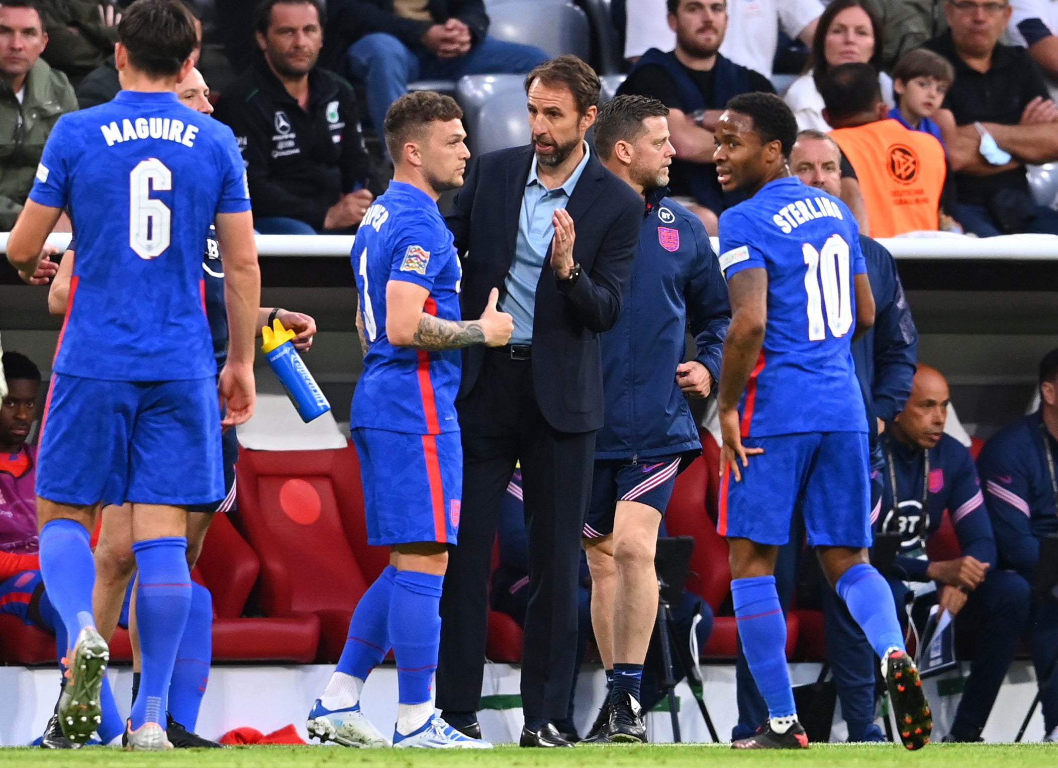 Kieran Trippier receives instructions from boss Gareth Southgate (Markus Ulmer/AP).