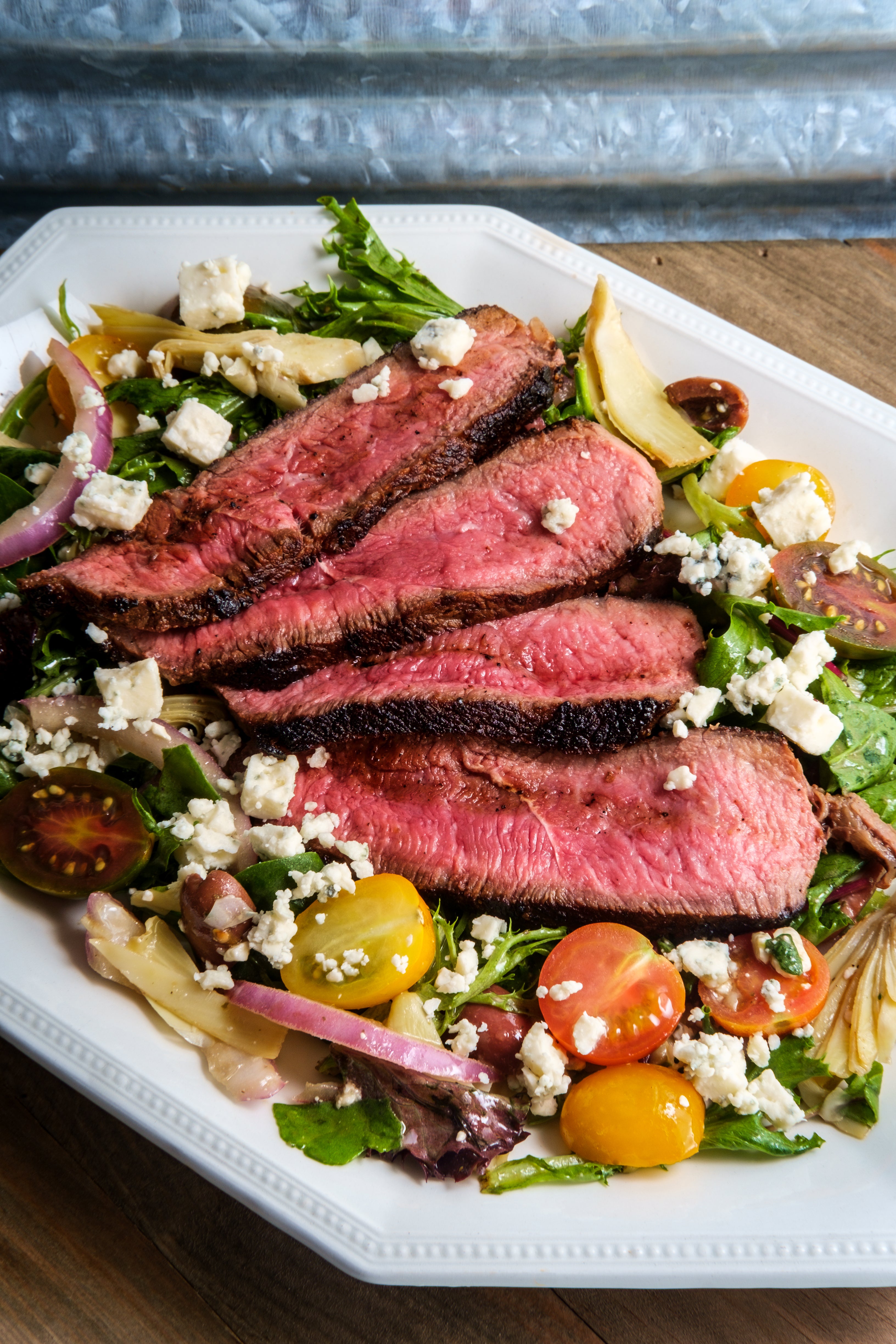 Salsa verde is both a marinade and a dressing in this summery dinner salad