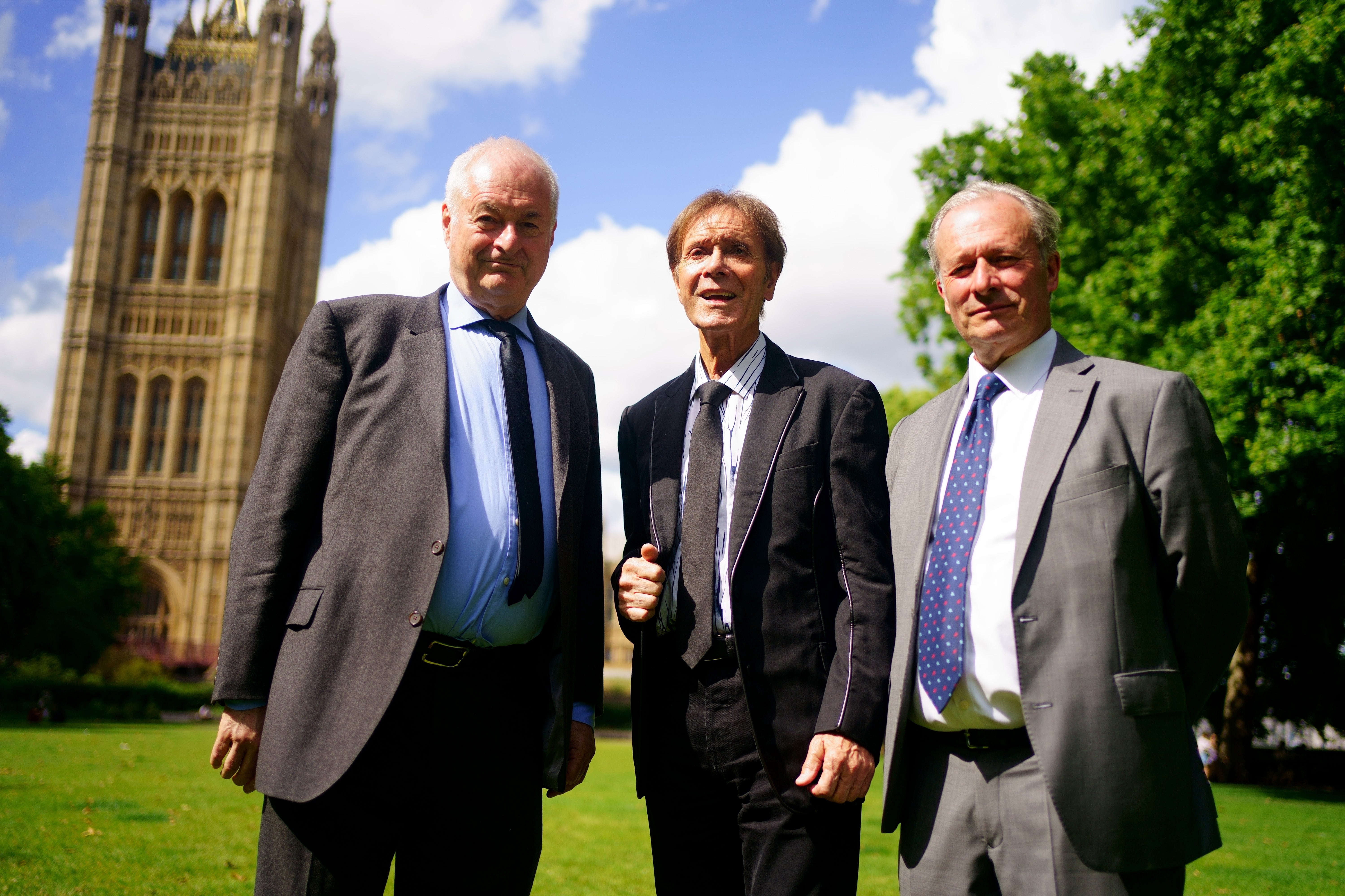 DJ Paul Gambaccini, singer Sir Cliff Richard and Daniel Janner QC (Victoria Jones/PA)