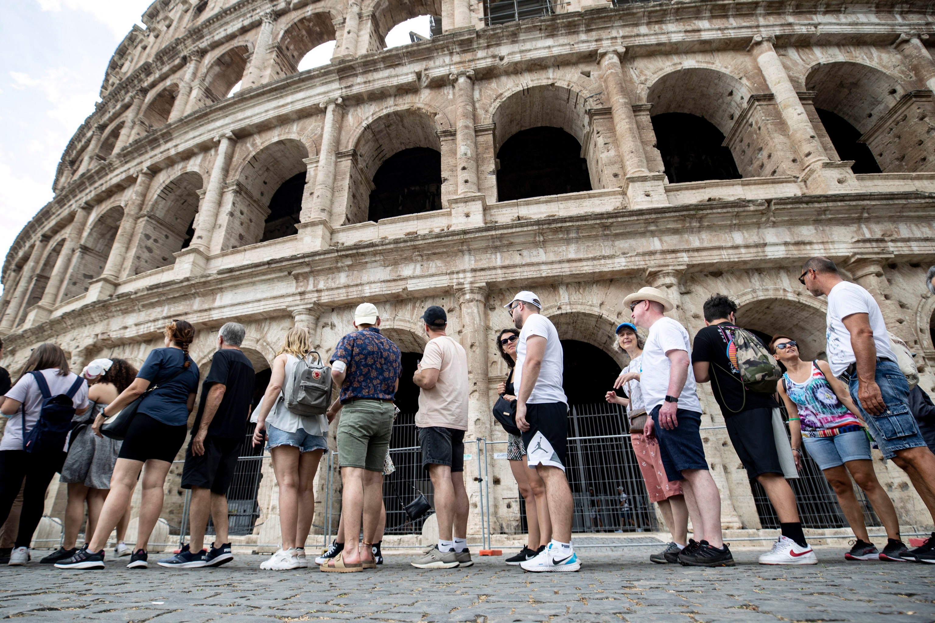 Tourists queue to enter the Colosseum earlier this week