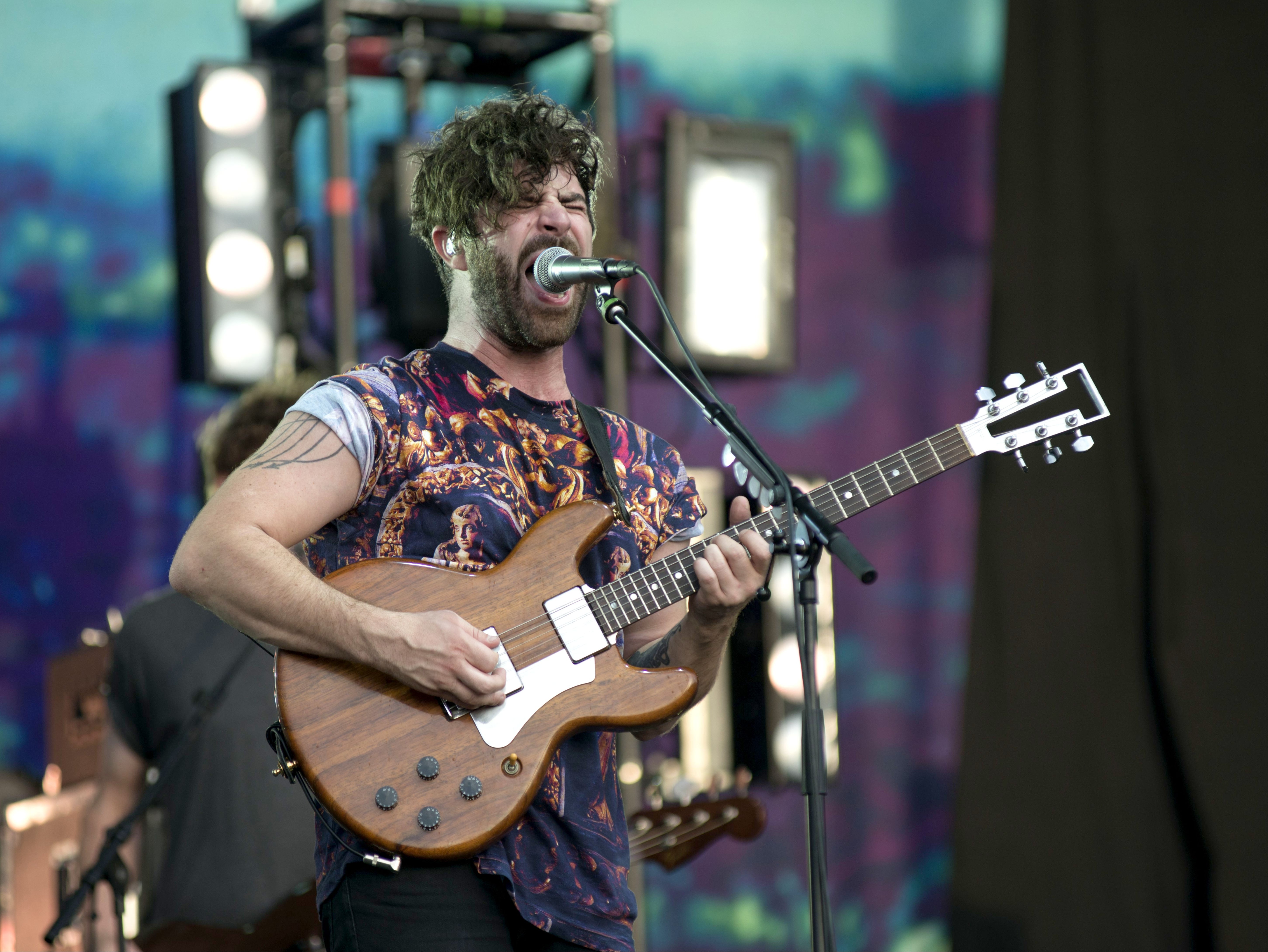 ‘I was ridden with angst and anger’: Yannis Philippakis performing with Foals at Glastonbury Festival, 2013