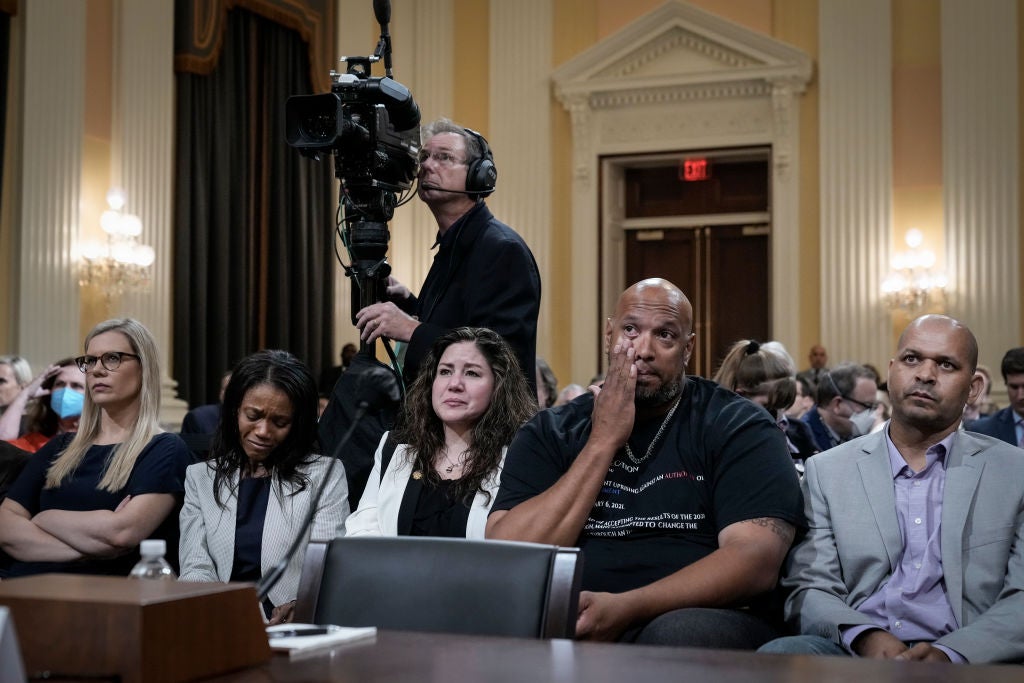 US Capitol Police officer Harry Dunn, flanked by the widow of Brian Sicknick, at Thursday’s hearing