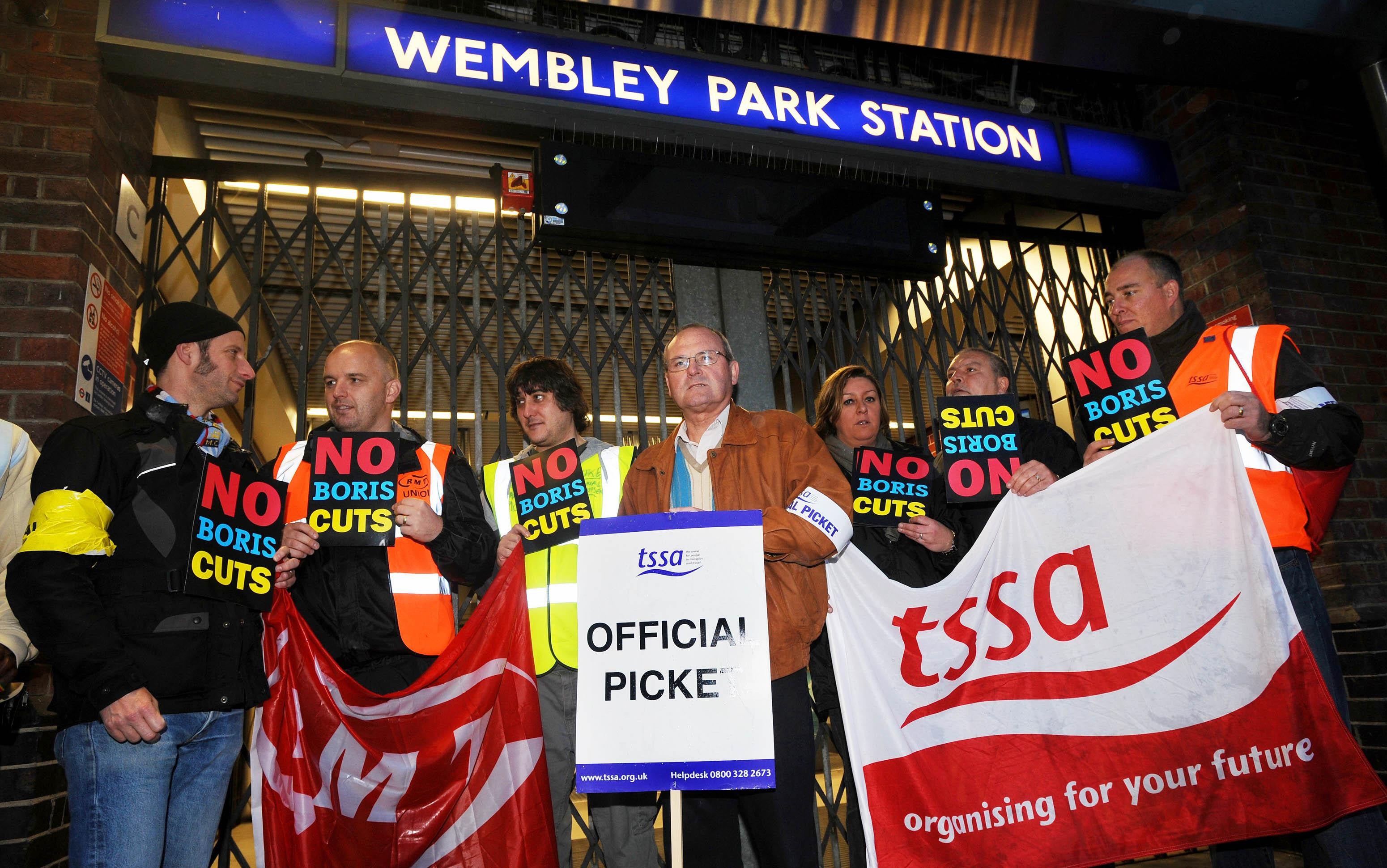 General Secretary of the TSSA union, Gerry Docherty (centre) outside Wembley Park Station, as commuters faced a struggle to get to work today as the latest Tube strike hit the capital.