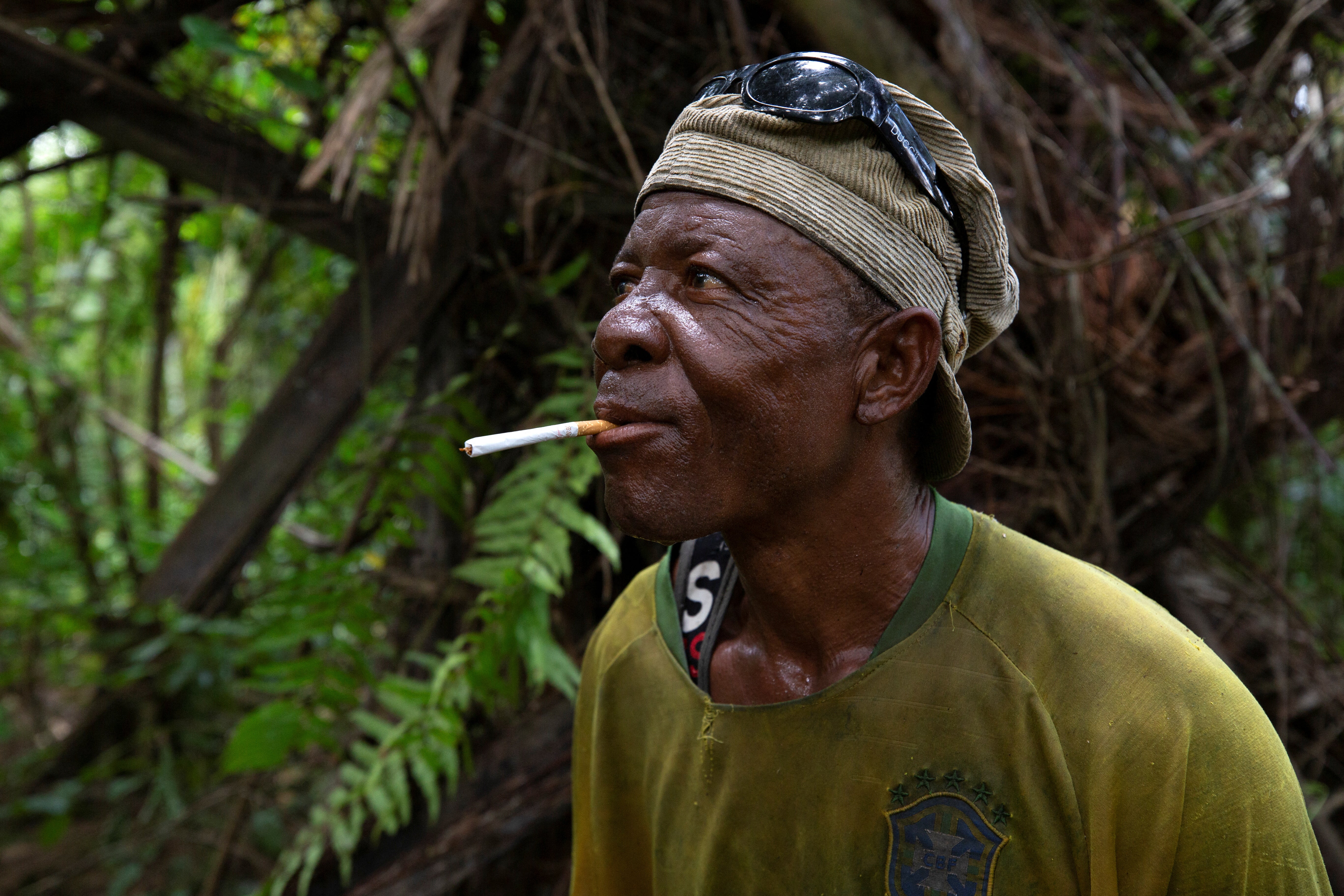 Marigi poses for a portrait during a smoke break