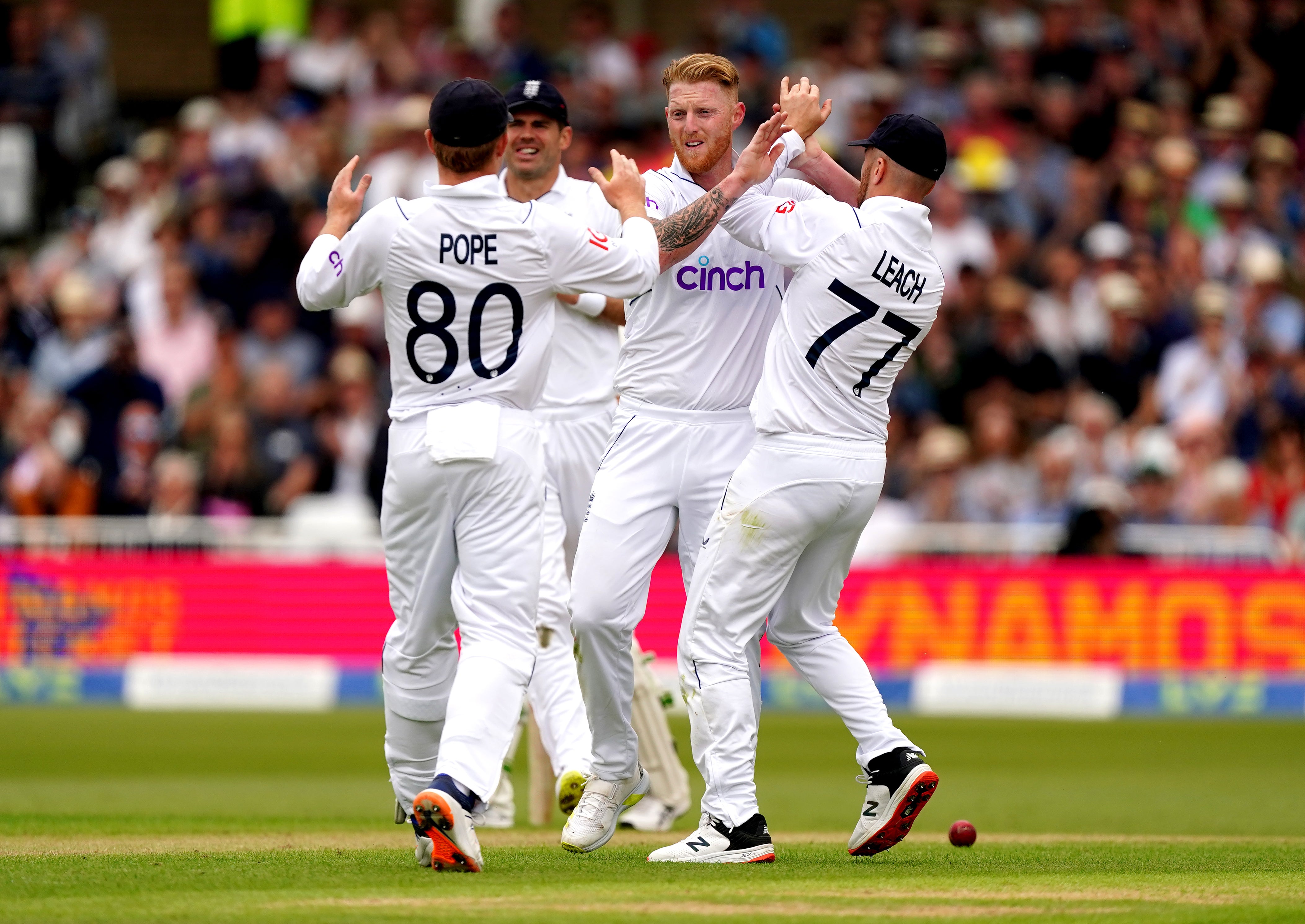 Ben Stokes, centre, is congratulated by England teammates (Mike Egerton/PA)