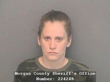 Jennifer Lair, 32, charged with two counts of neglect of a dependent, along with two counts of animal cruelty