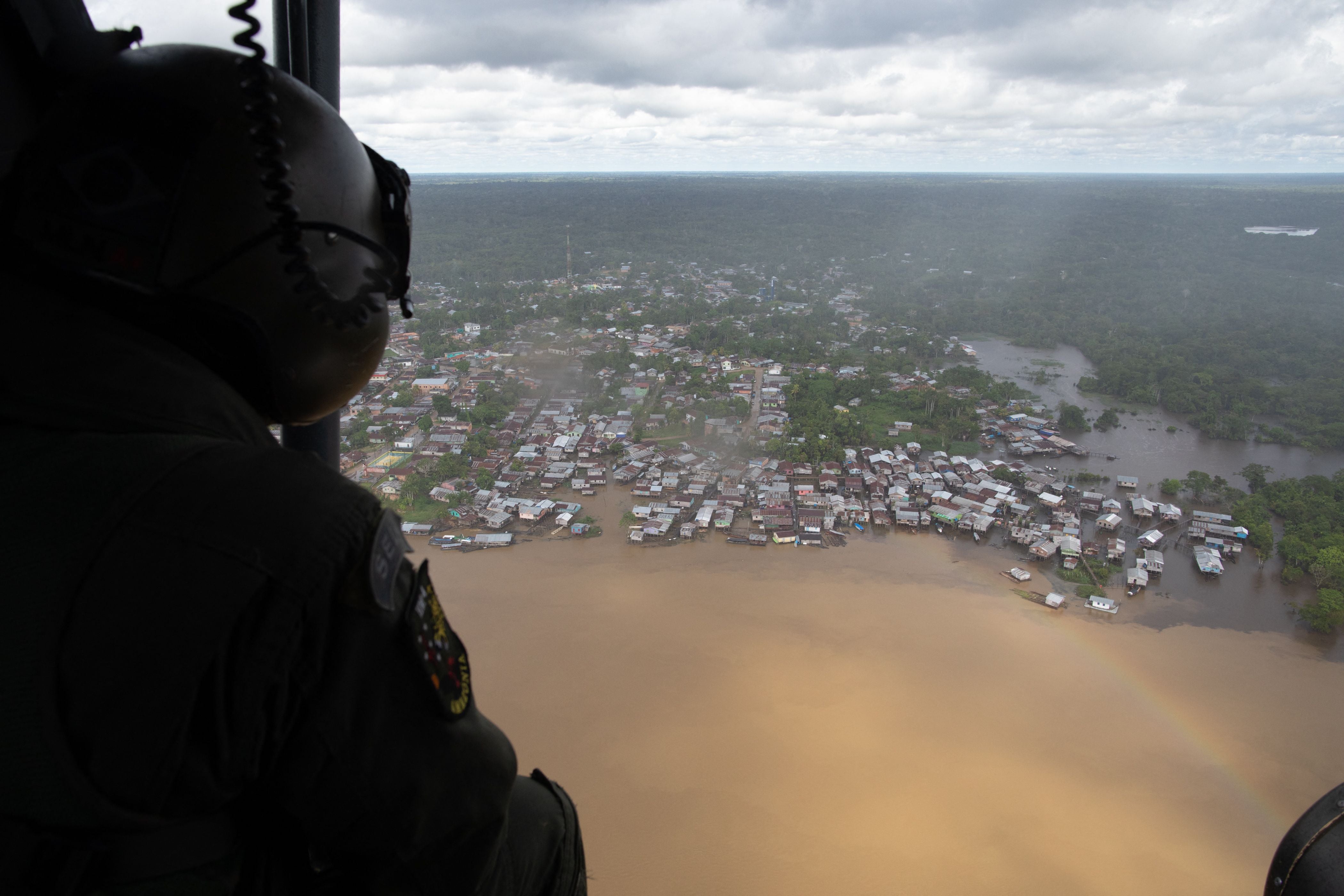 A helicopter patrols Atalaia do Norte in the search for missing Bruno Pereira and Dom Phillips