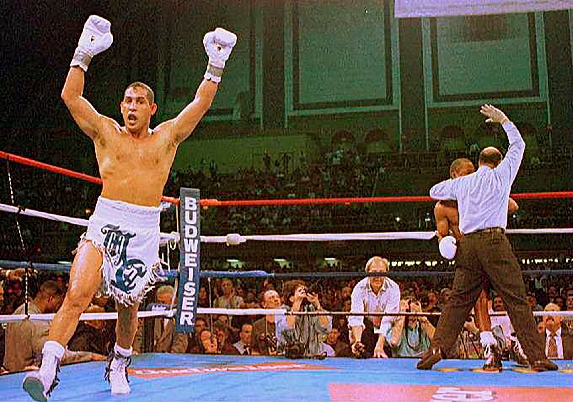 Hector Camacho celebrates after beating Sugar Ray Leonard