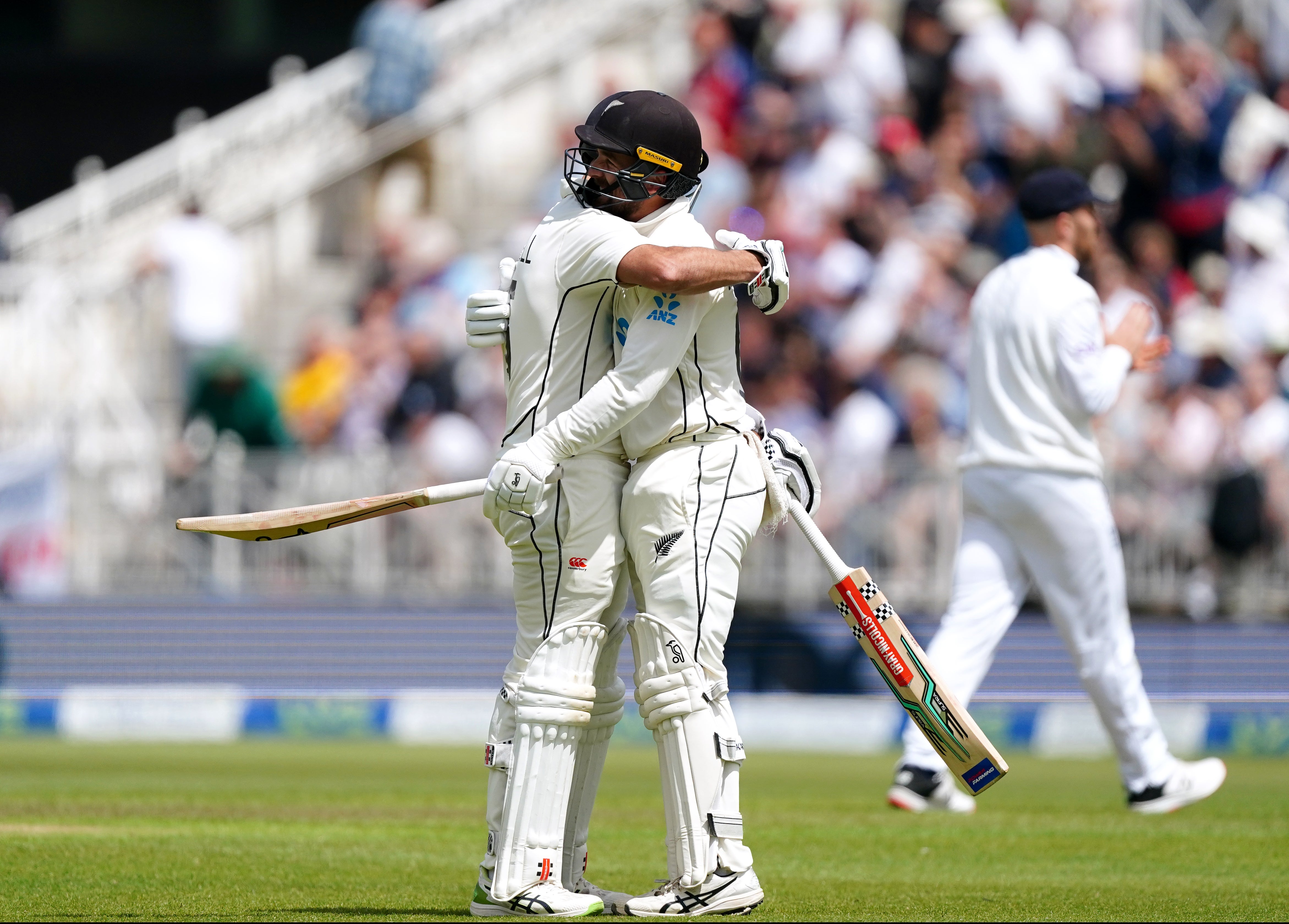 New Zealand’s Tom Blundell (right) hugs team-mate Daryl Mitchell after reaching his century against England at Trent Bridge (Mike Egerton/PA Images).