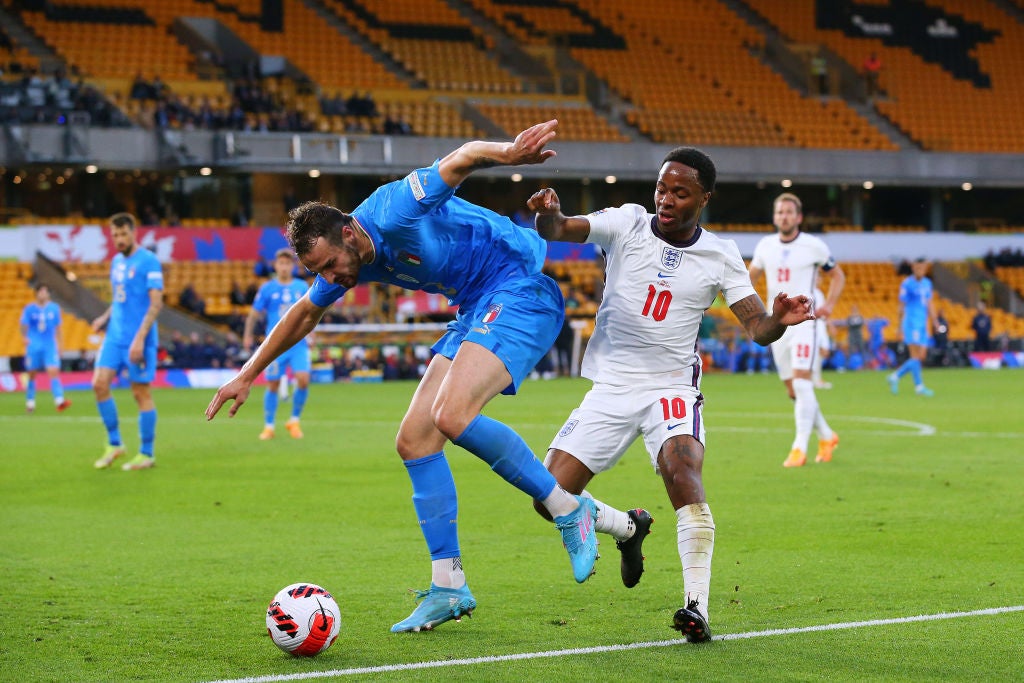 Federico Gatti is challenged by Raheem Sterling