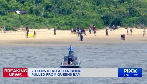 Two teenagers die after being dragged under water by a rip tide as they swam in the water off New York