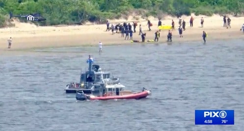 Two teenagers died after being dragged underwater by a rip tide as they swam in the water off New York