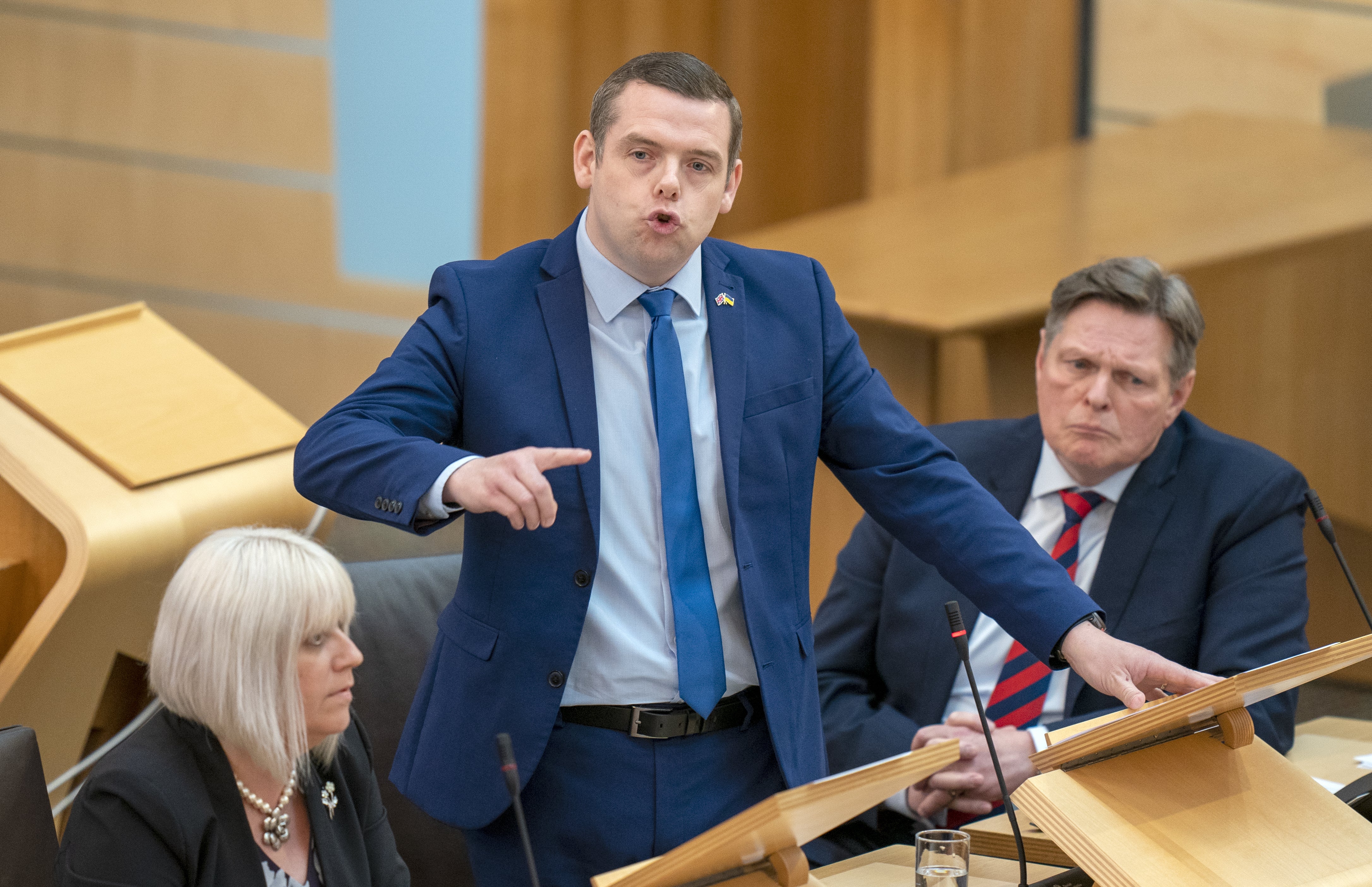 Douglas Ross and all but two of his MPs voted against the prime minister last Monday