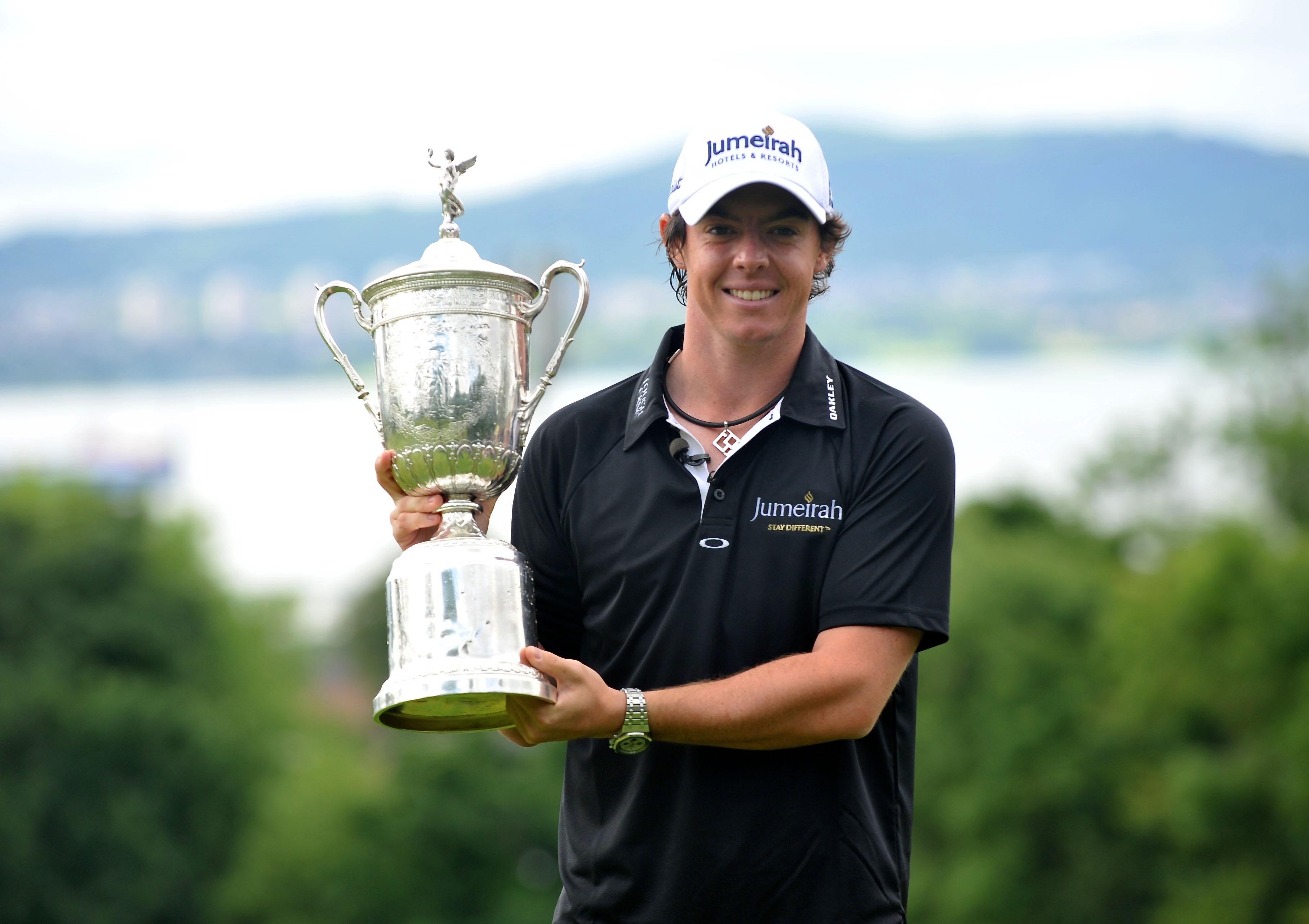 Newly-crowned US Open champion Rory McIlroy poses with the trophy during a celebration at Holywood Golf Club, County Down (Stephen Wilson/PA)