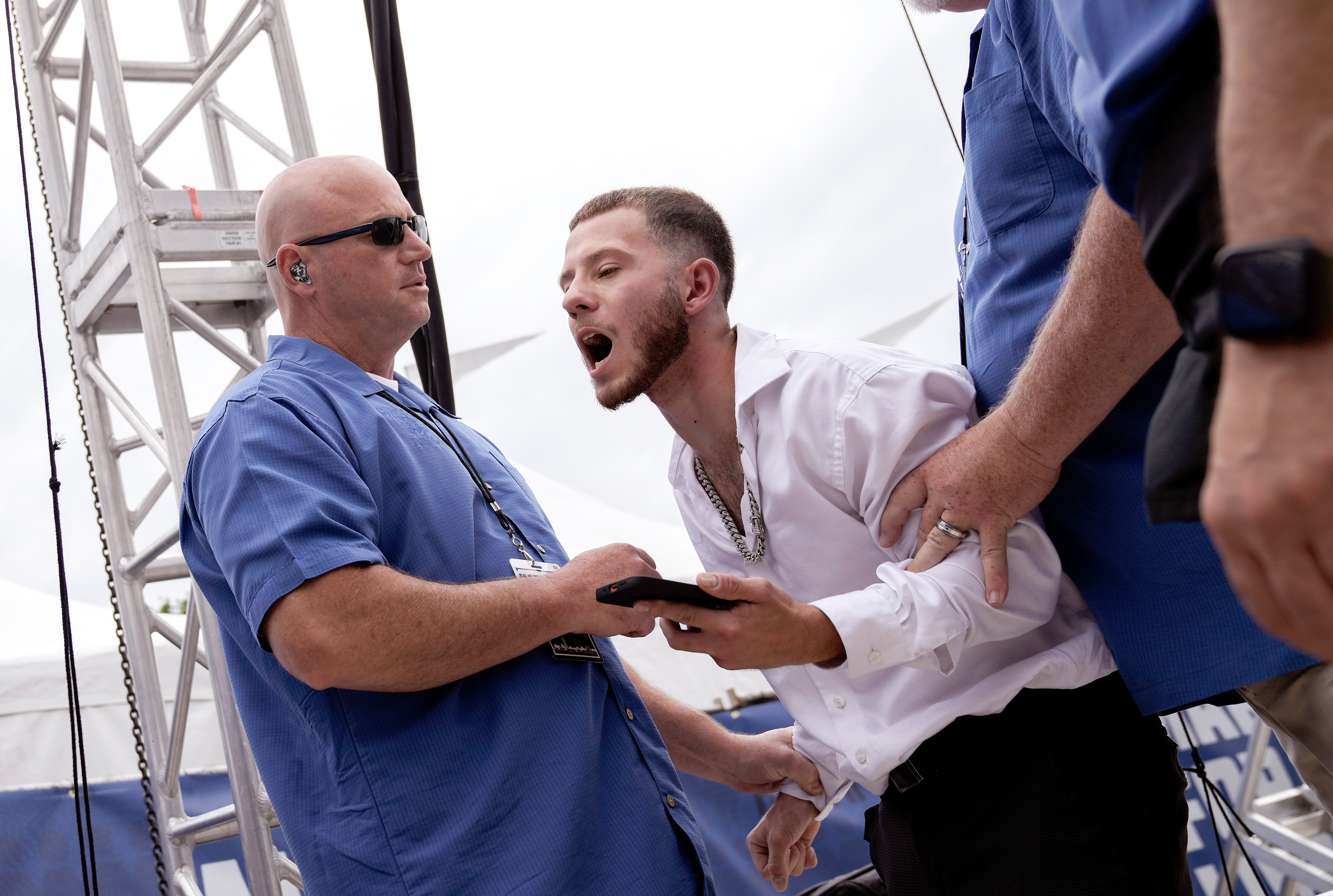 A man is detained by US Park Police after trying to storm the stage at the March For Our Lives rally